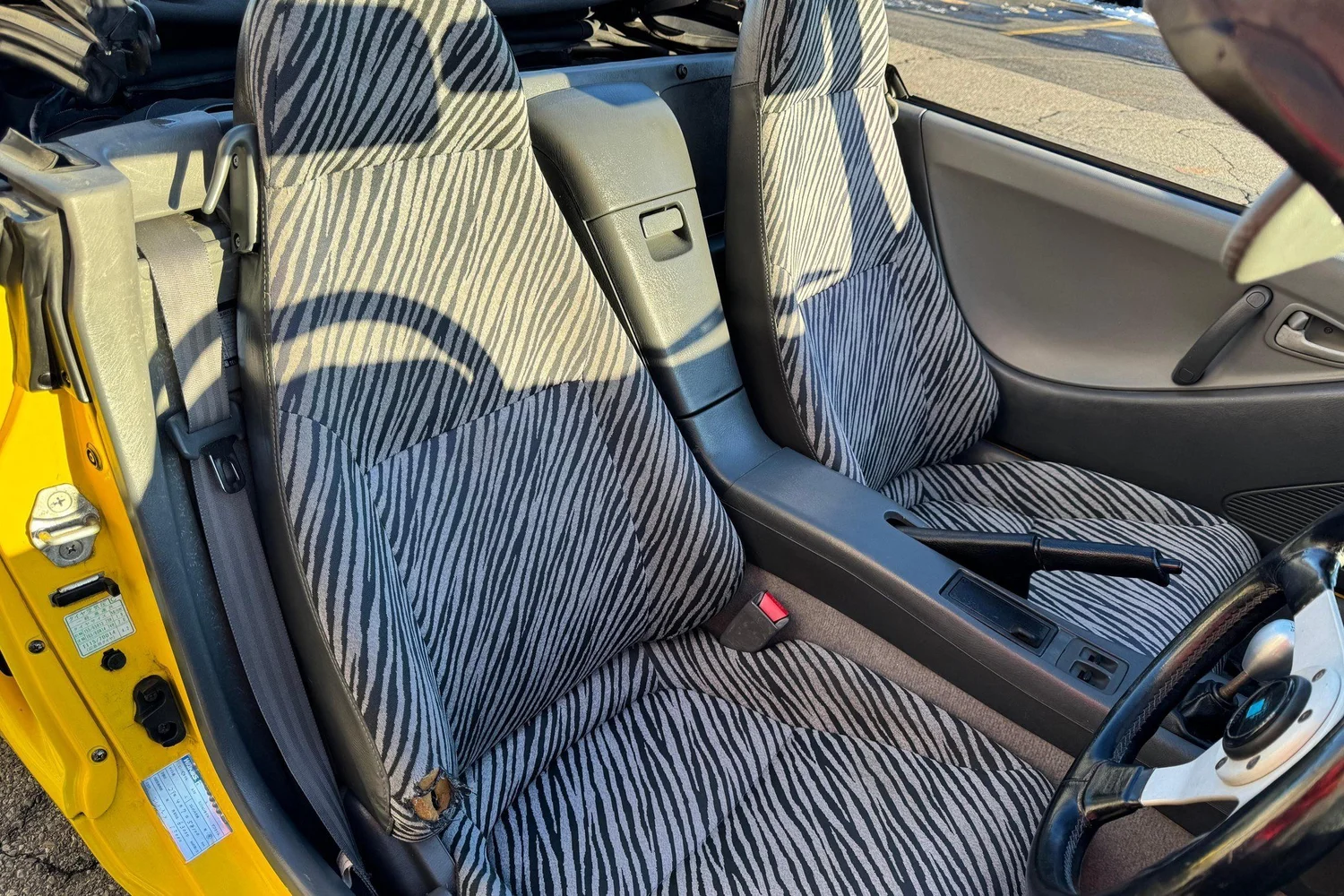 Zebra-print cloth seats in the 1991 Honda Beat sold in Spokane