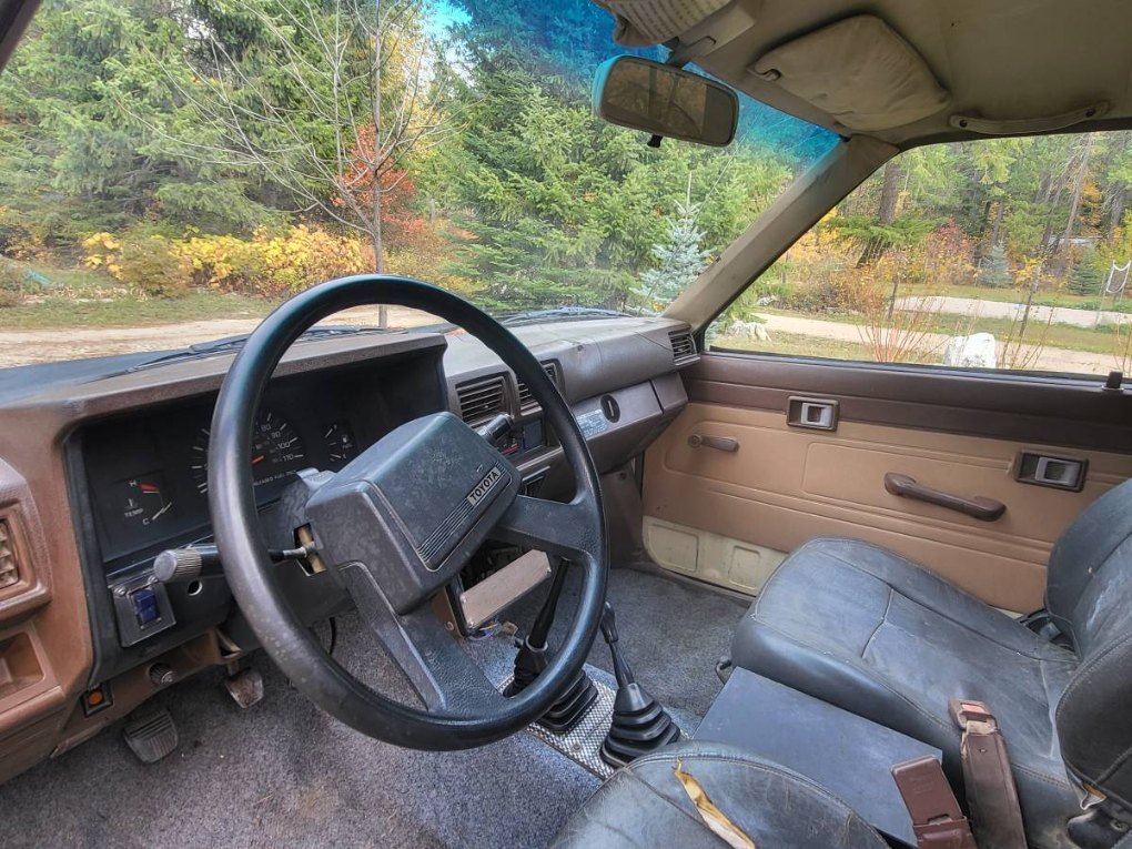 Brown interior and Toyota steering wheel of the 1985 4Runner in Valley, Washington