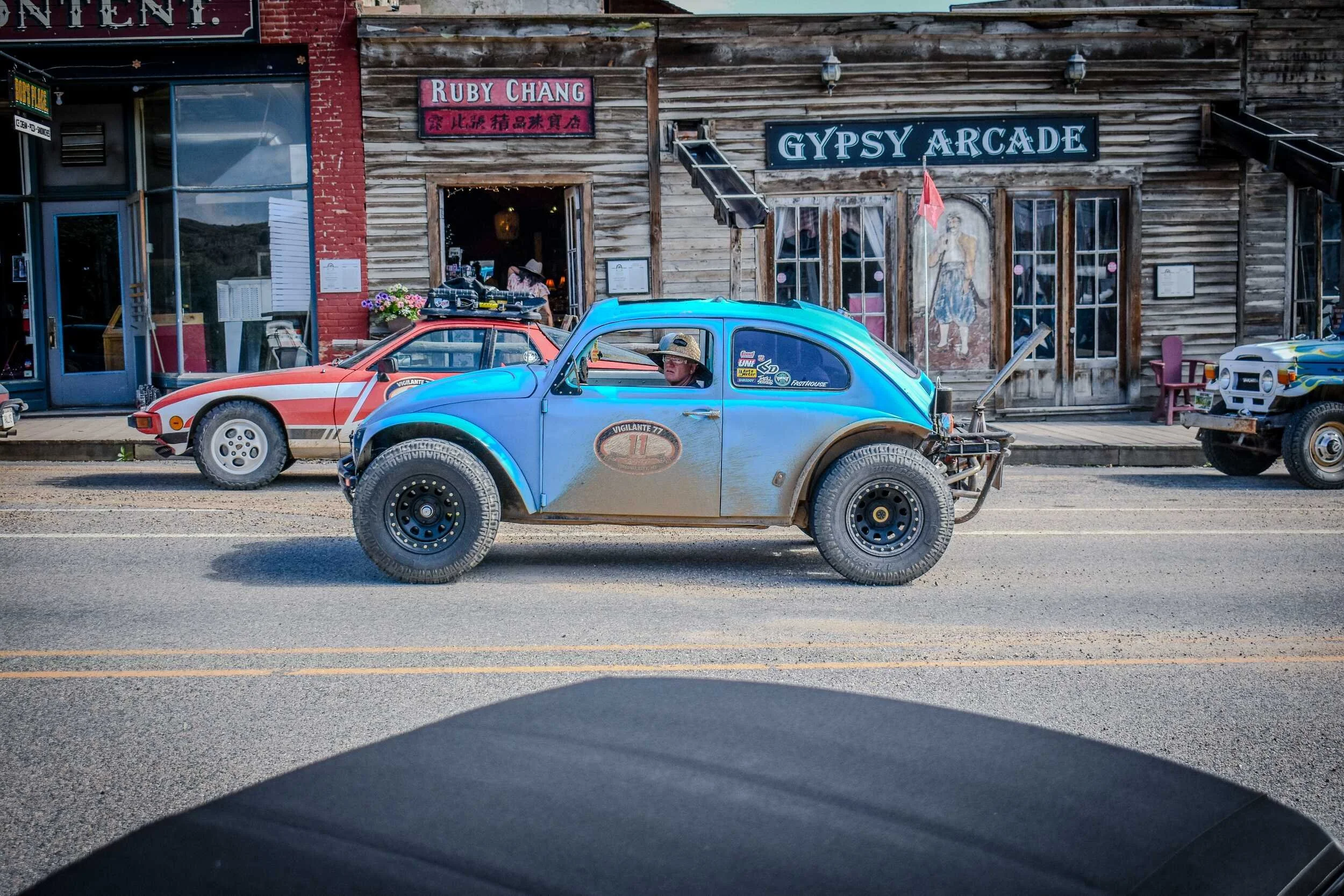 Lifted two-tone Baja Beetle on Wallace Street in Virginia City