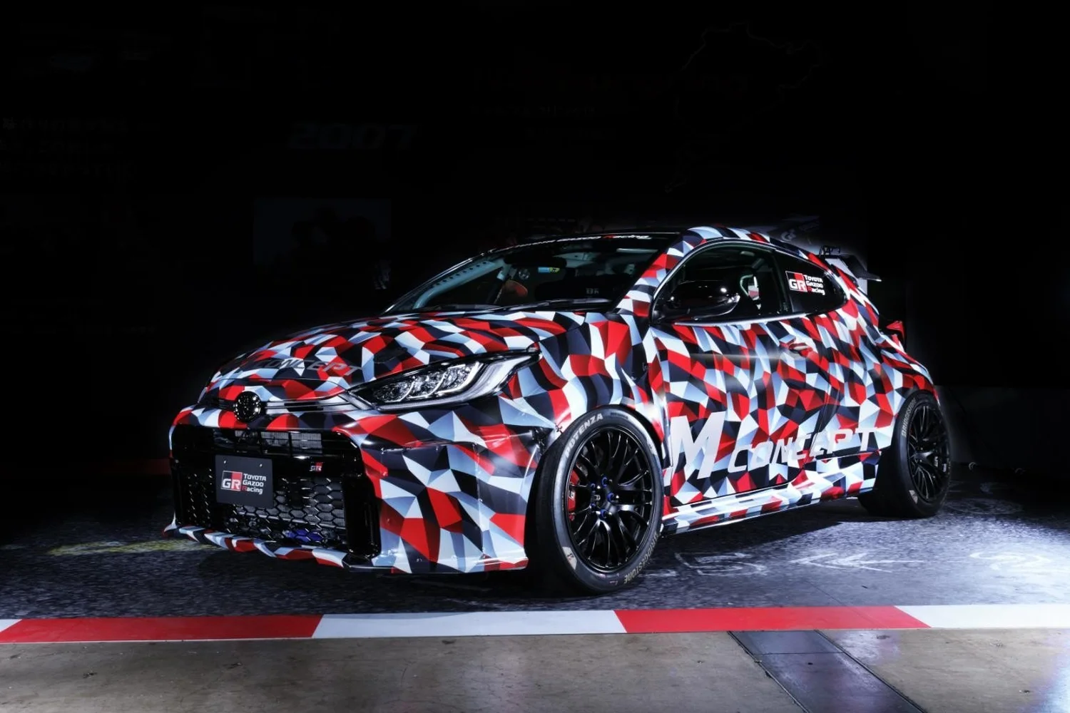 Camouflaged Toyota GR Yaris M Concept mid-engine test car at Tokyo Auto Salon