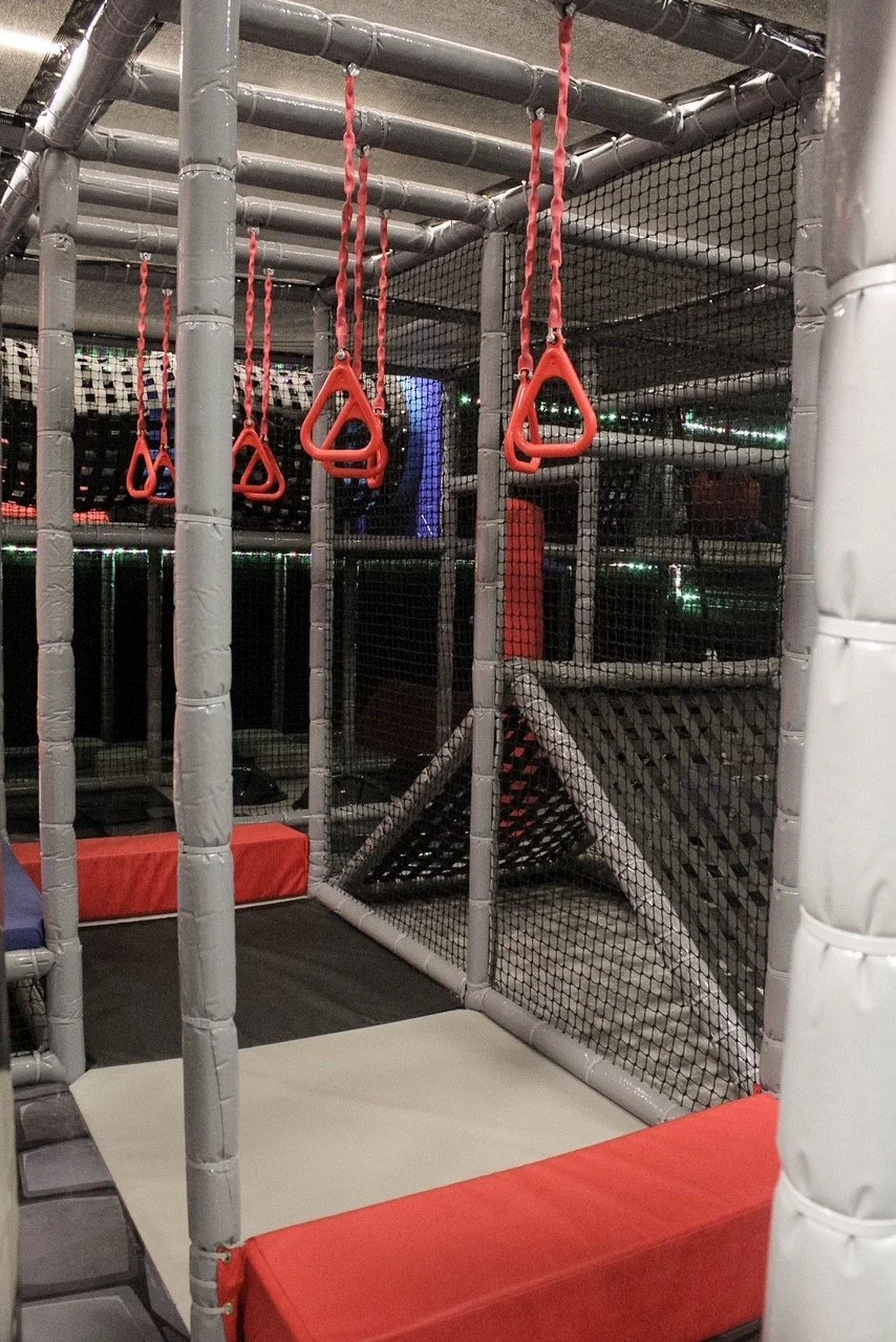Rings, nets and climbs inside the Den