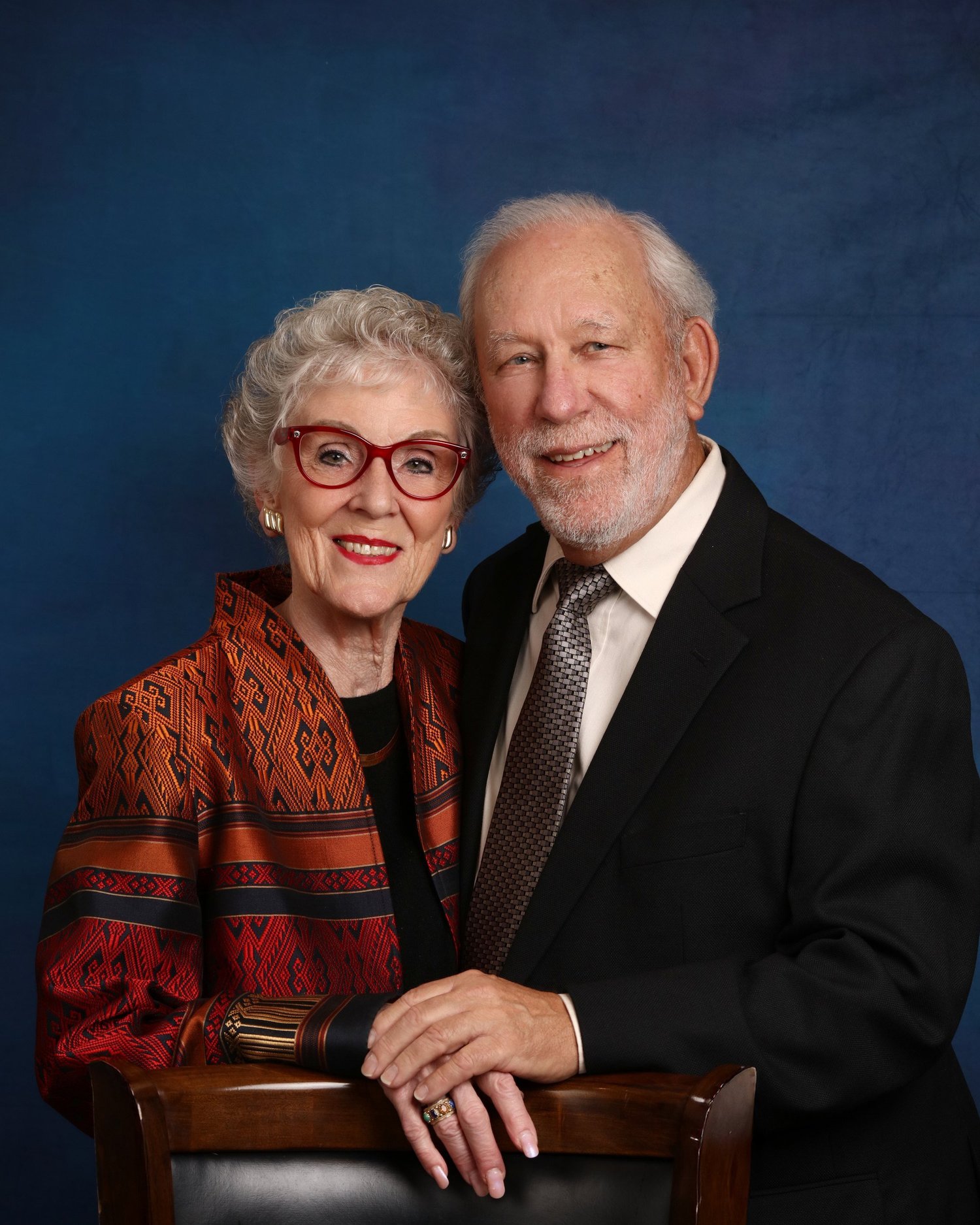 A couple's portrait made at their club