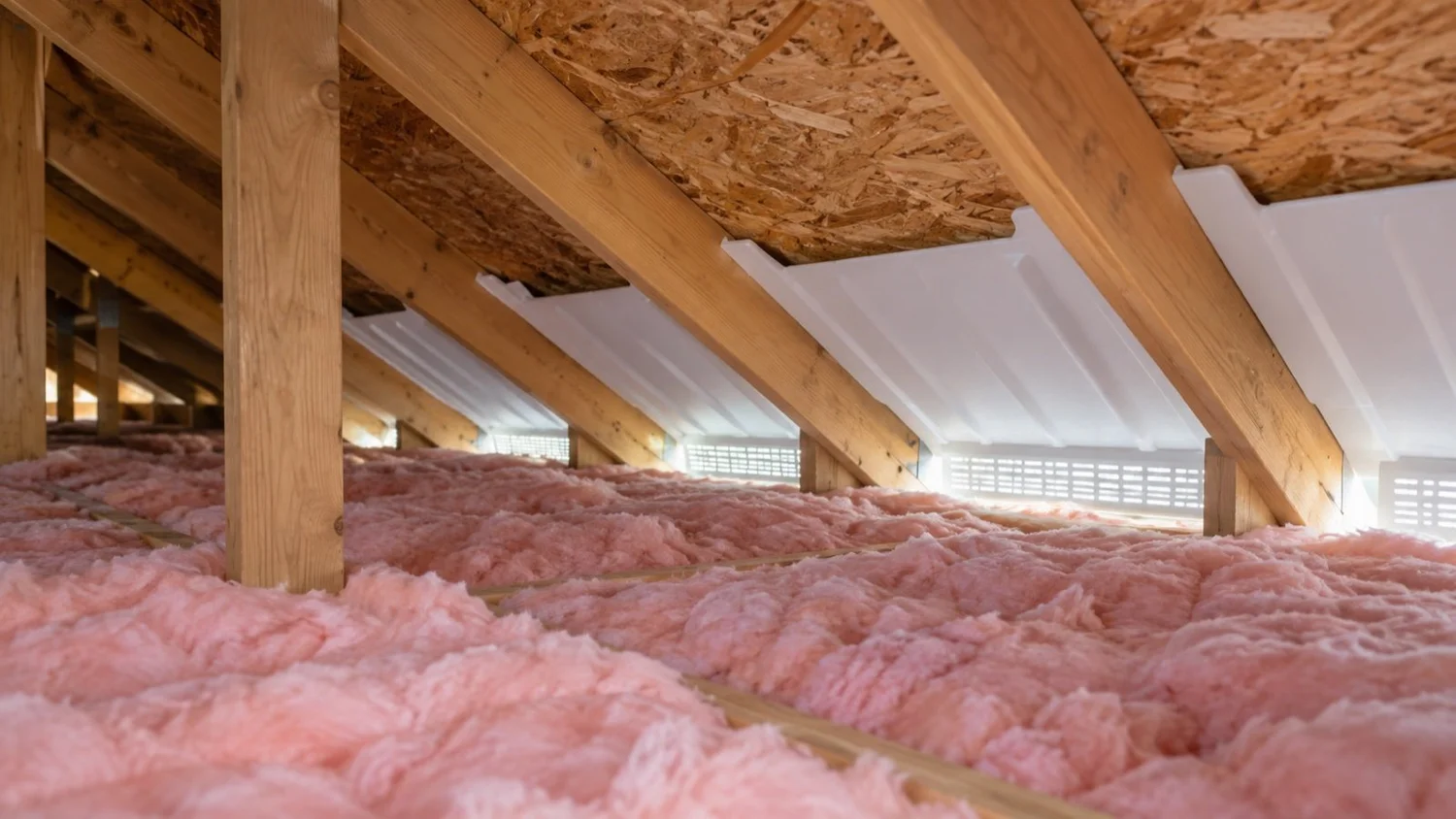 Attic with insulation and baffles at the eaves keeping an air channel open