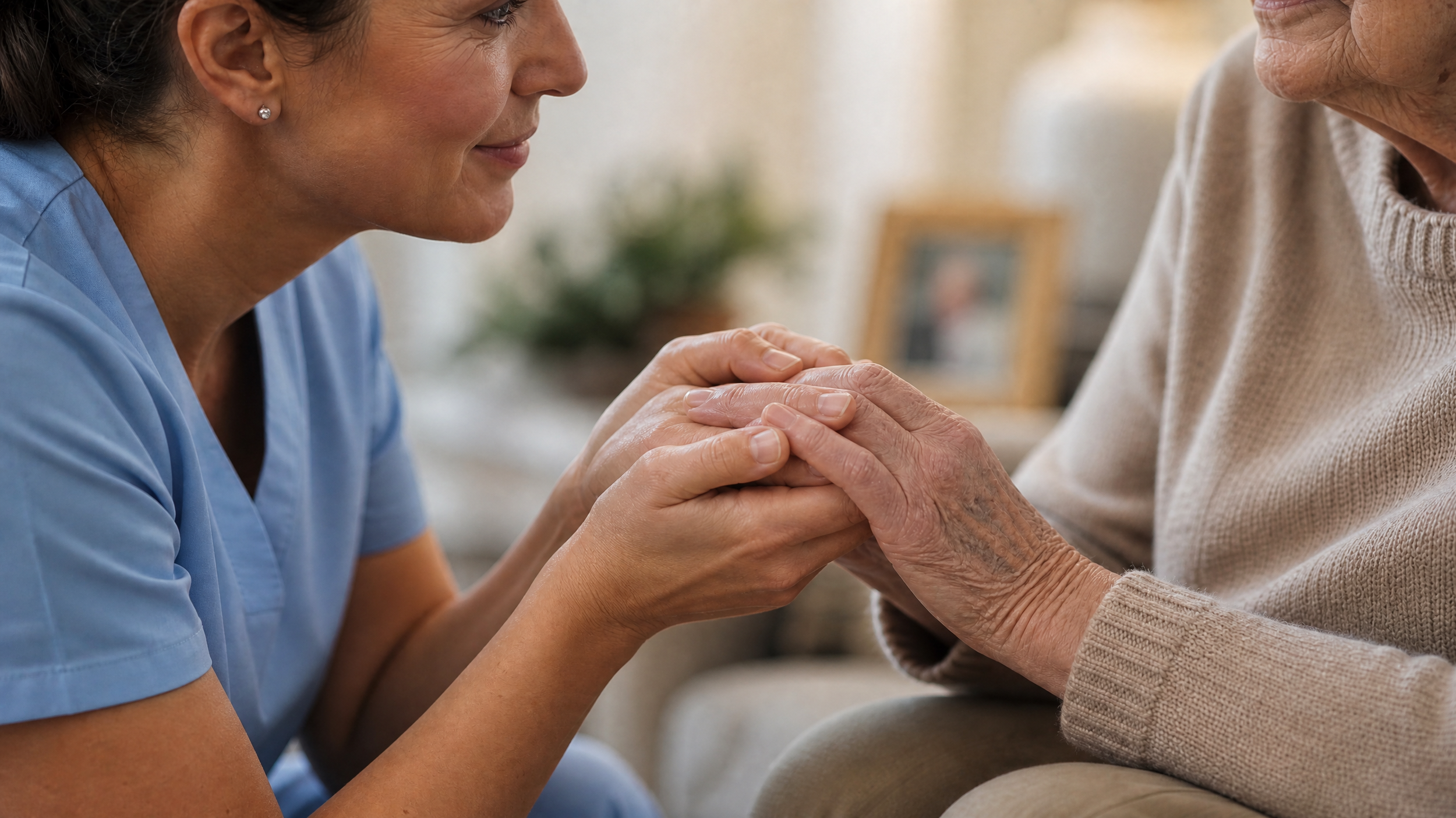 Caregiver playing cards with a senior at home