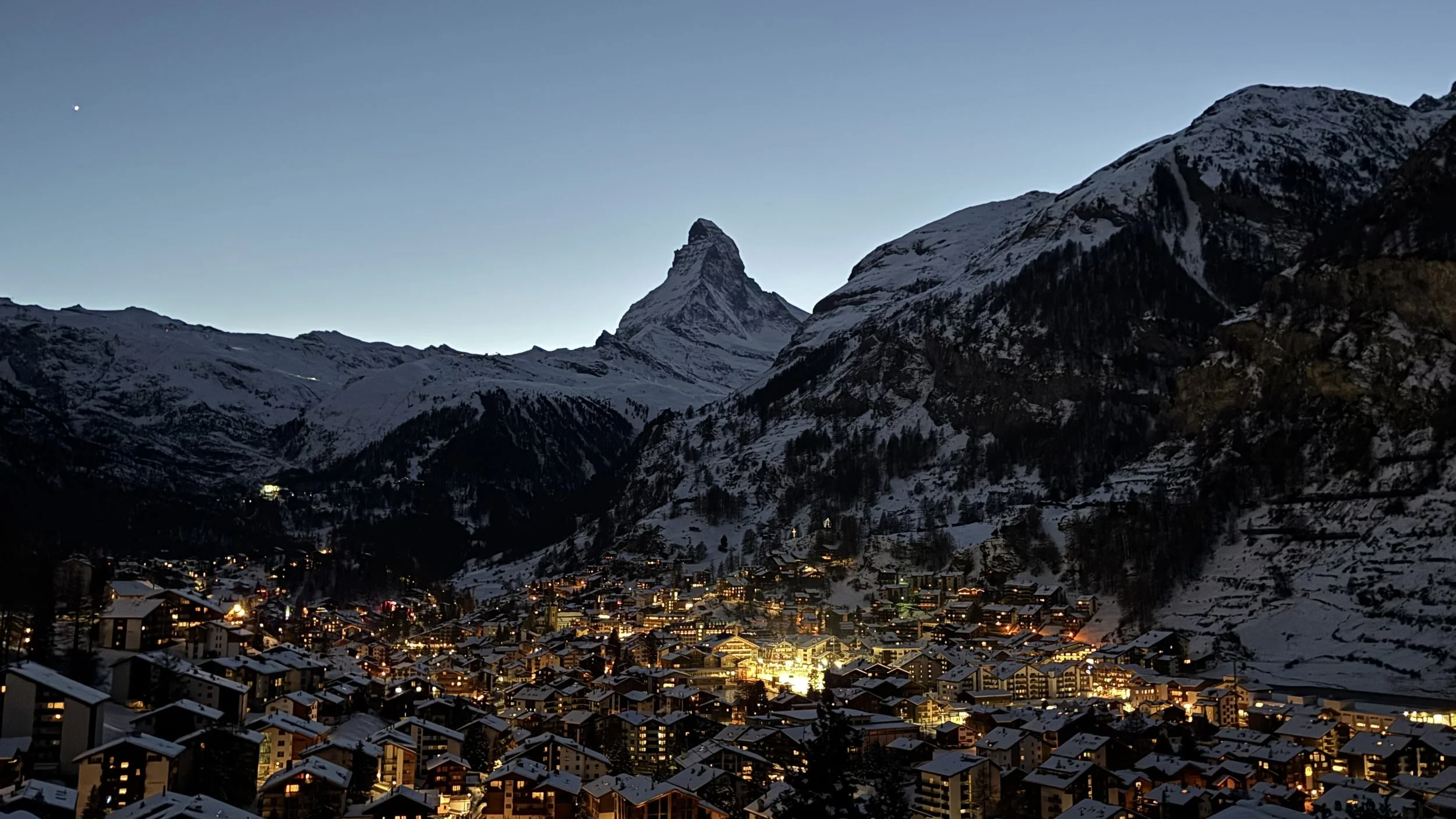 Matterhorn over village at night
