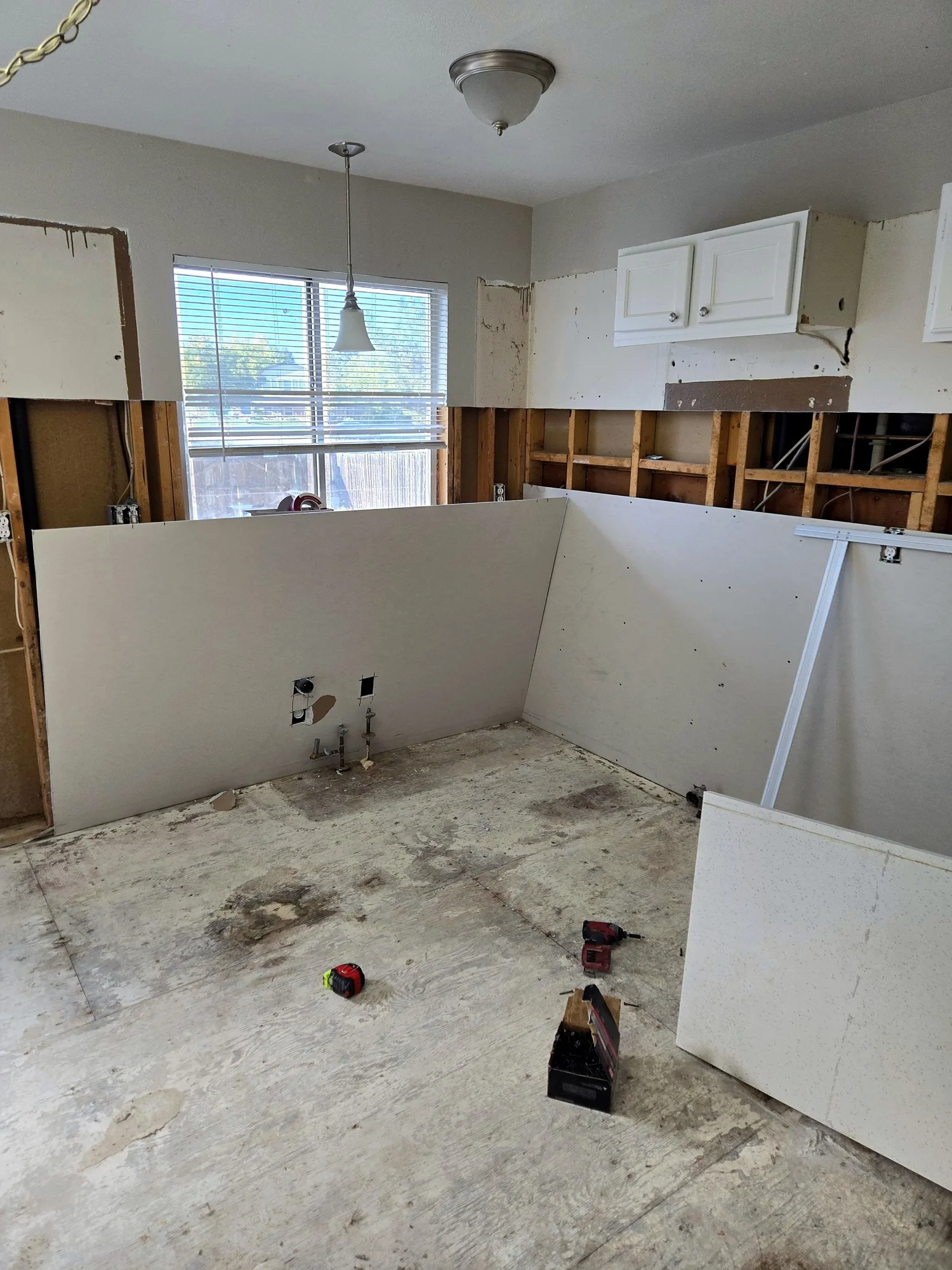 Kitchen gutted to the studs before renovation in Denver, CO