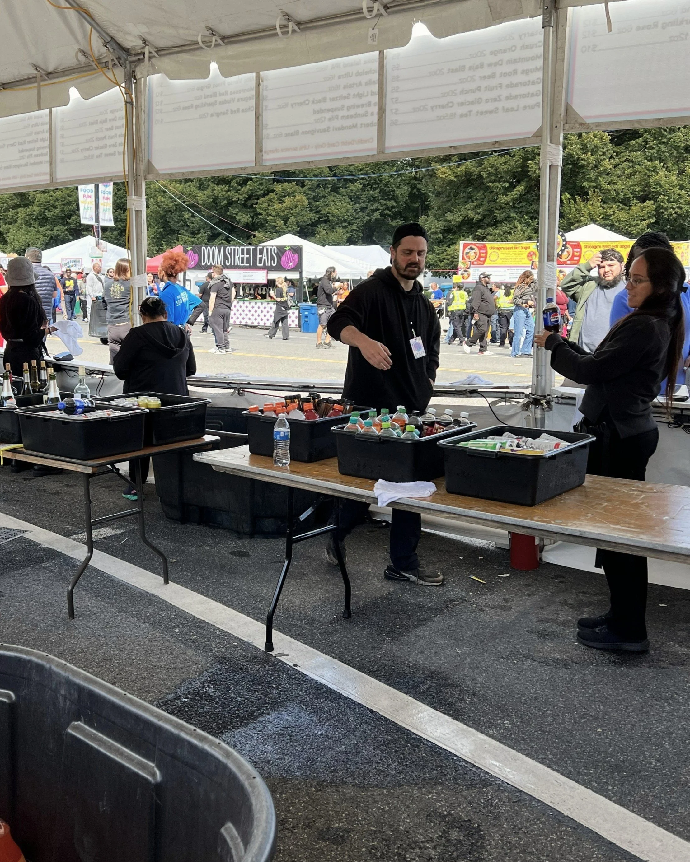 Festival staff preparing beverage station