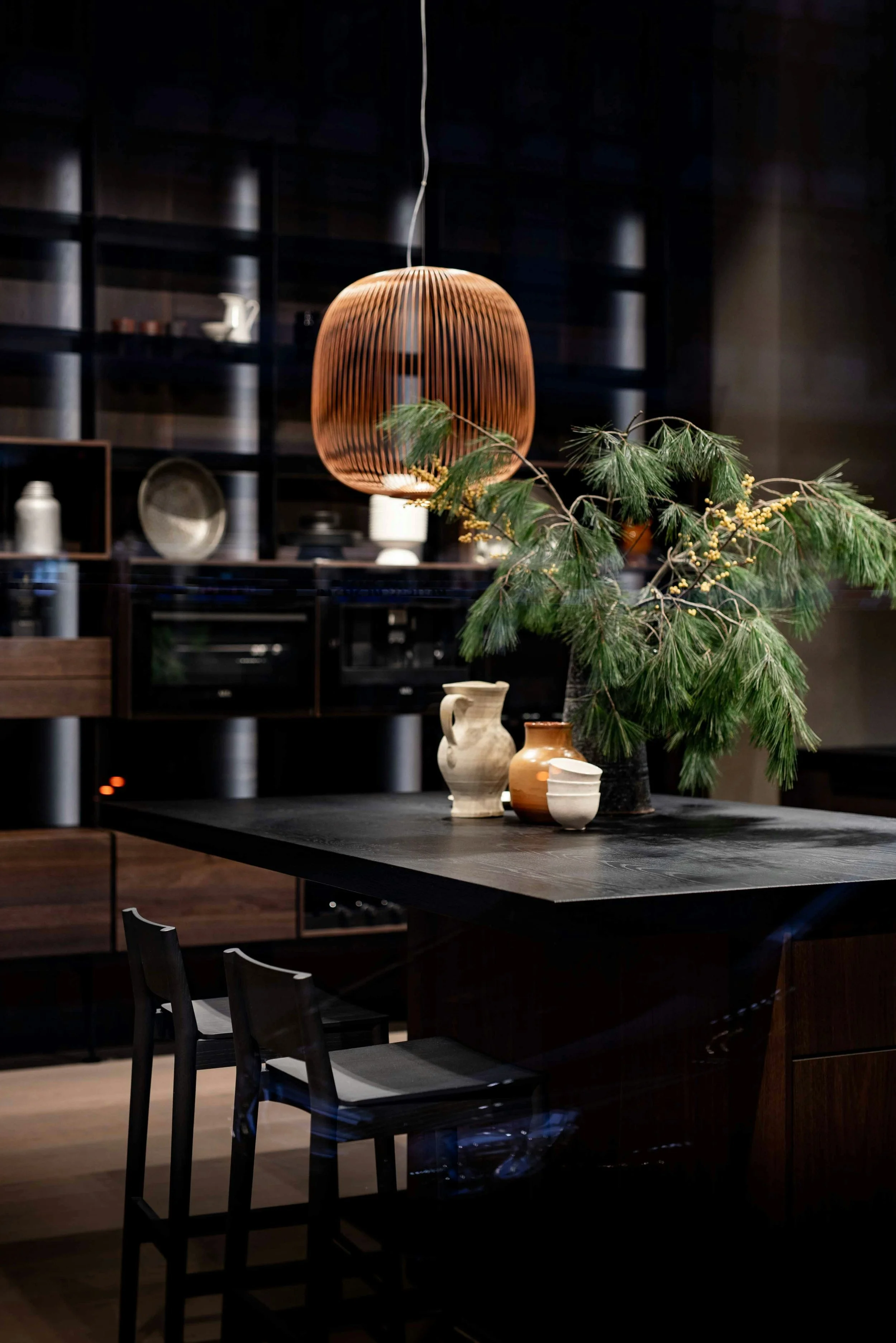 Contemporary kitchen with a dark island