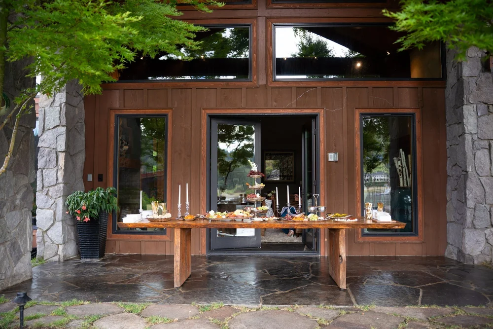 A grazing table on a stone patio