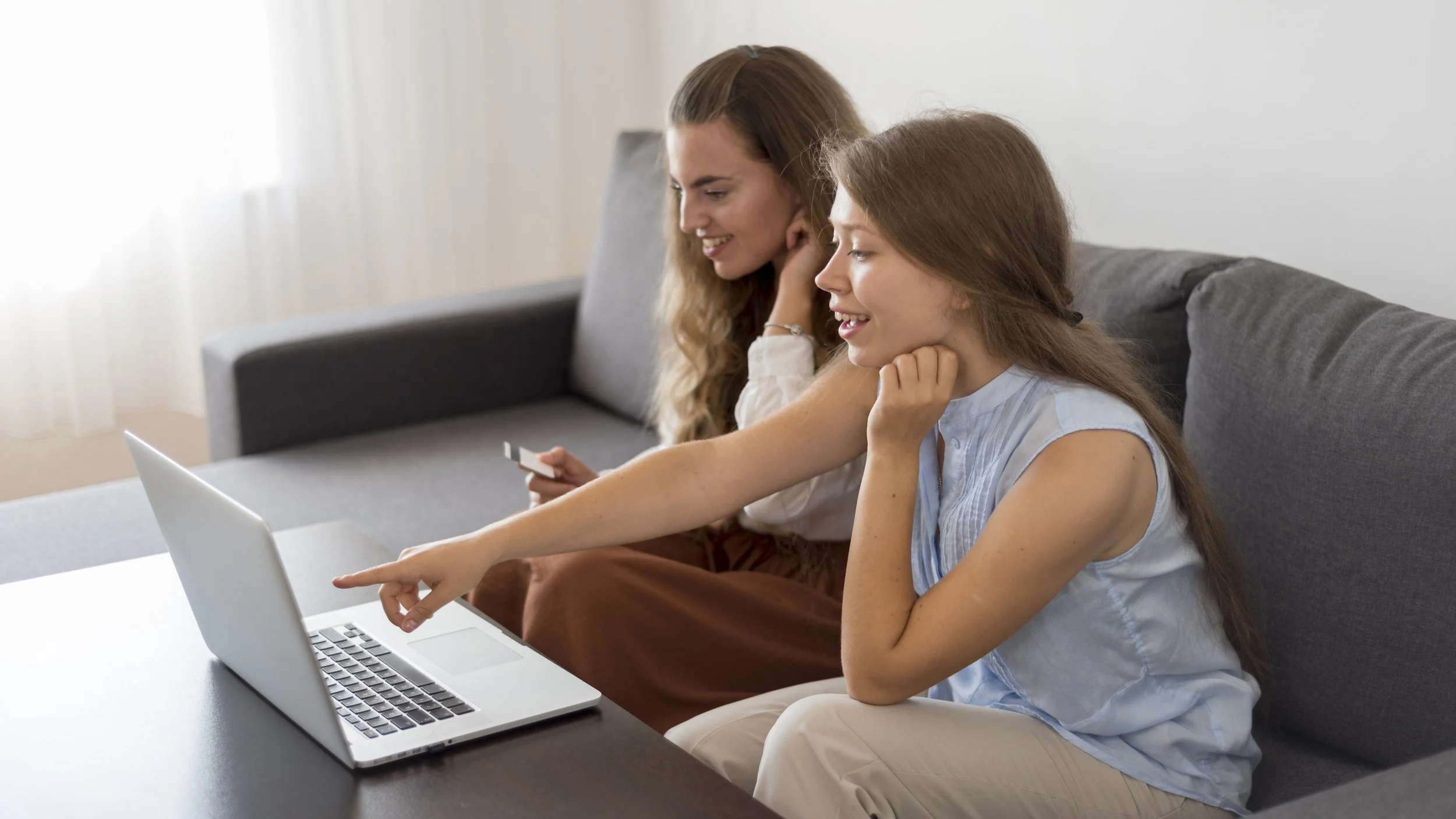 A parent and teen reviewing safety resources together