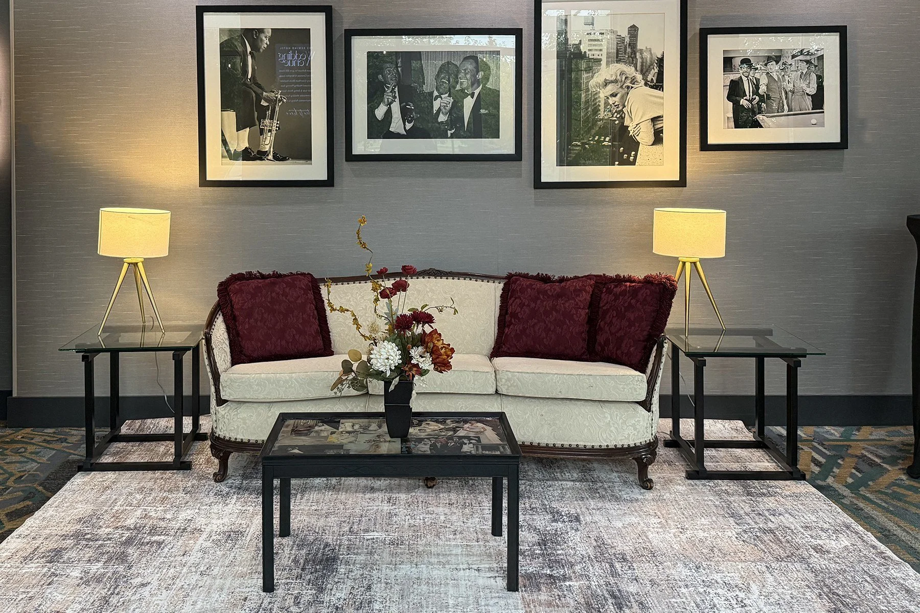 White vintage couch lounge at an event.