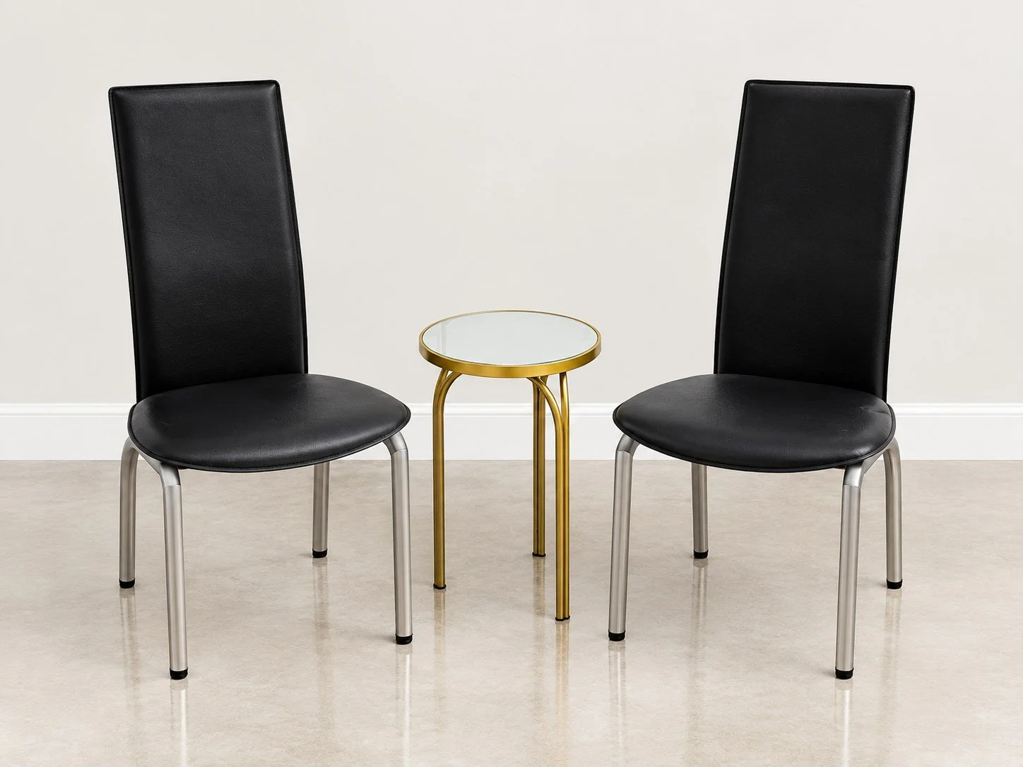 Black High Back Sweetheart Table Chairs shown with a gold table.