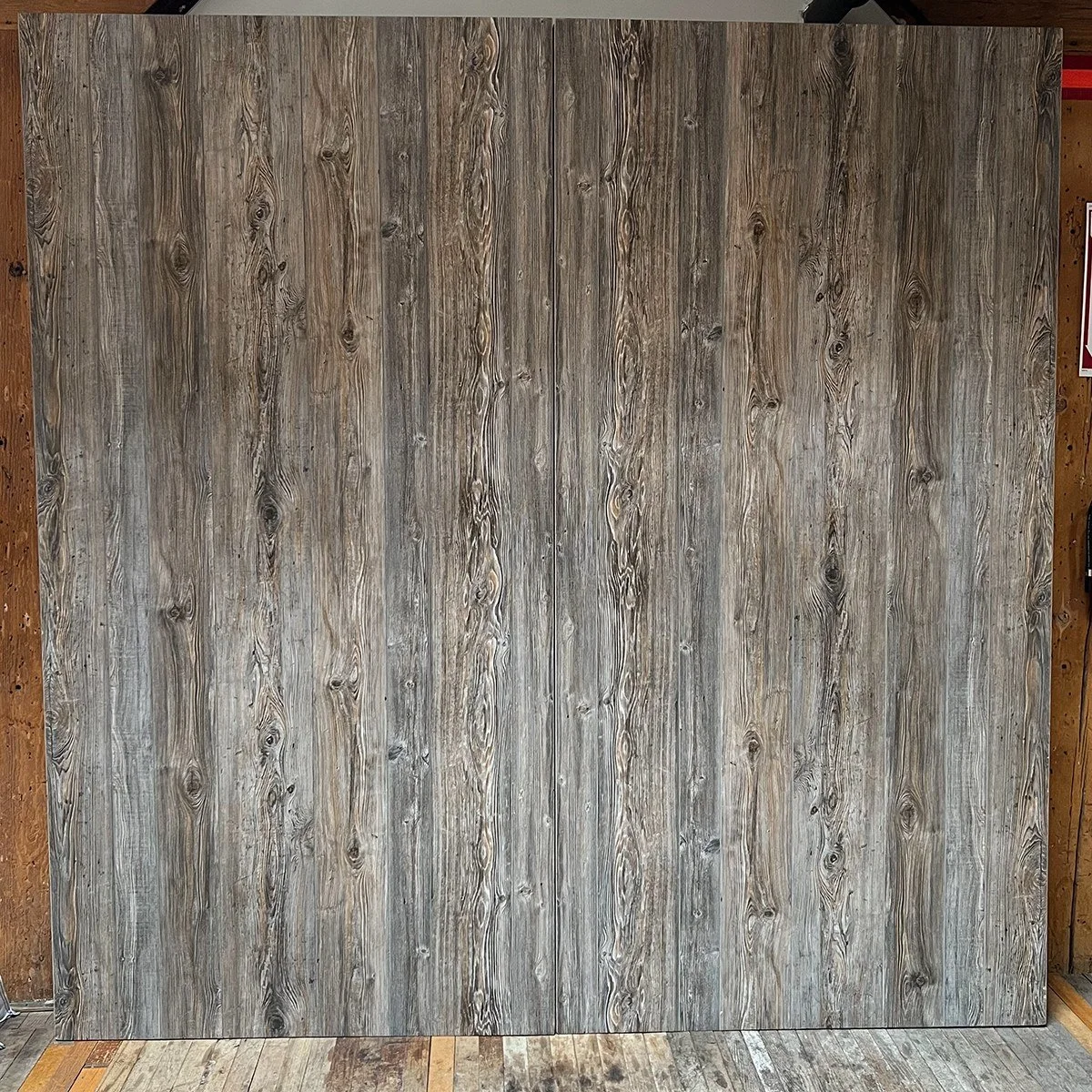 Wood Panel Backdrop with a weathered wood finish.