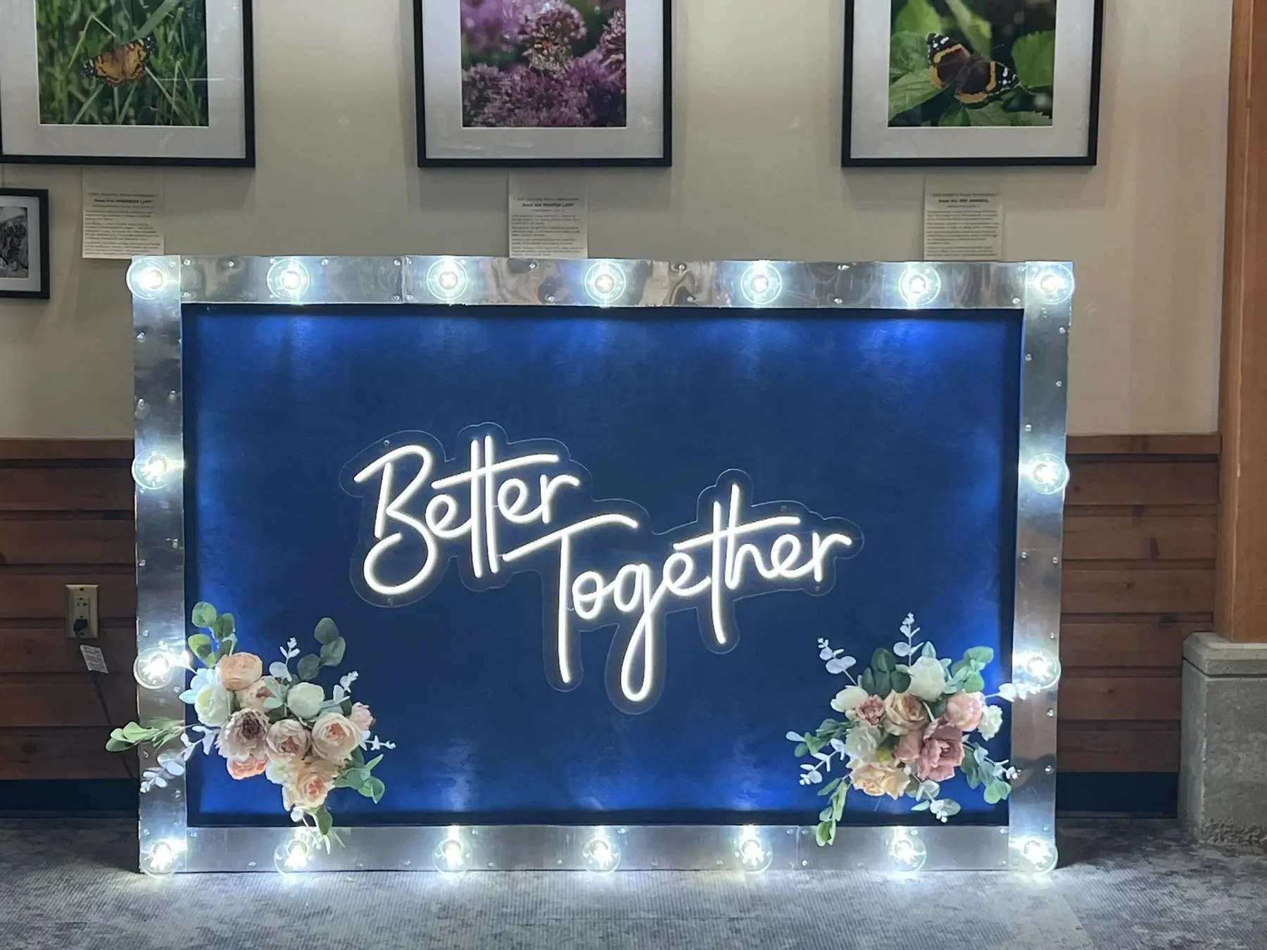 Custom Marquee with an illuminated frame, Better Together sign and floral accents.