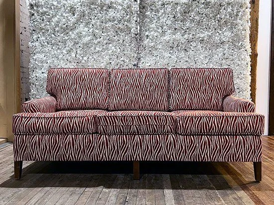 Orange & White Striped Couch.