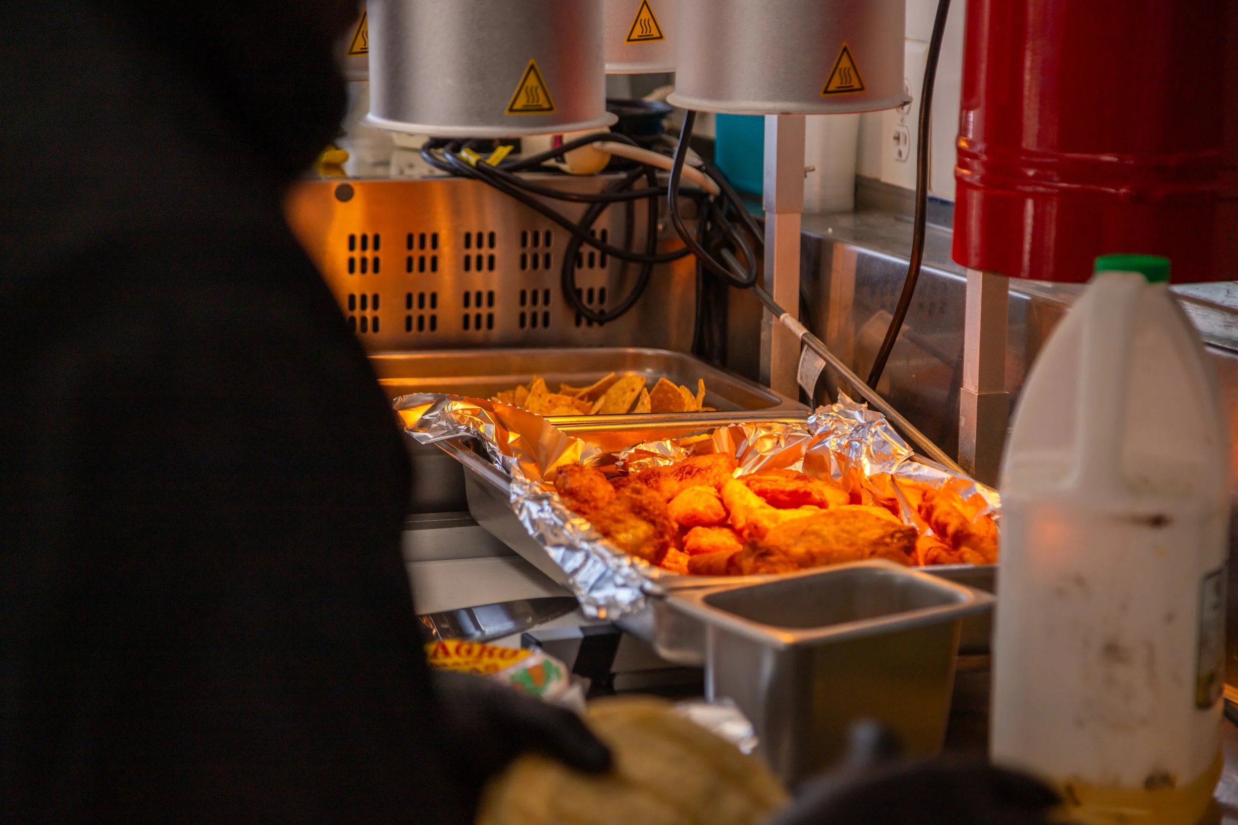 Food finishing inside the Lavender Haze mobile kitchen