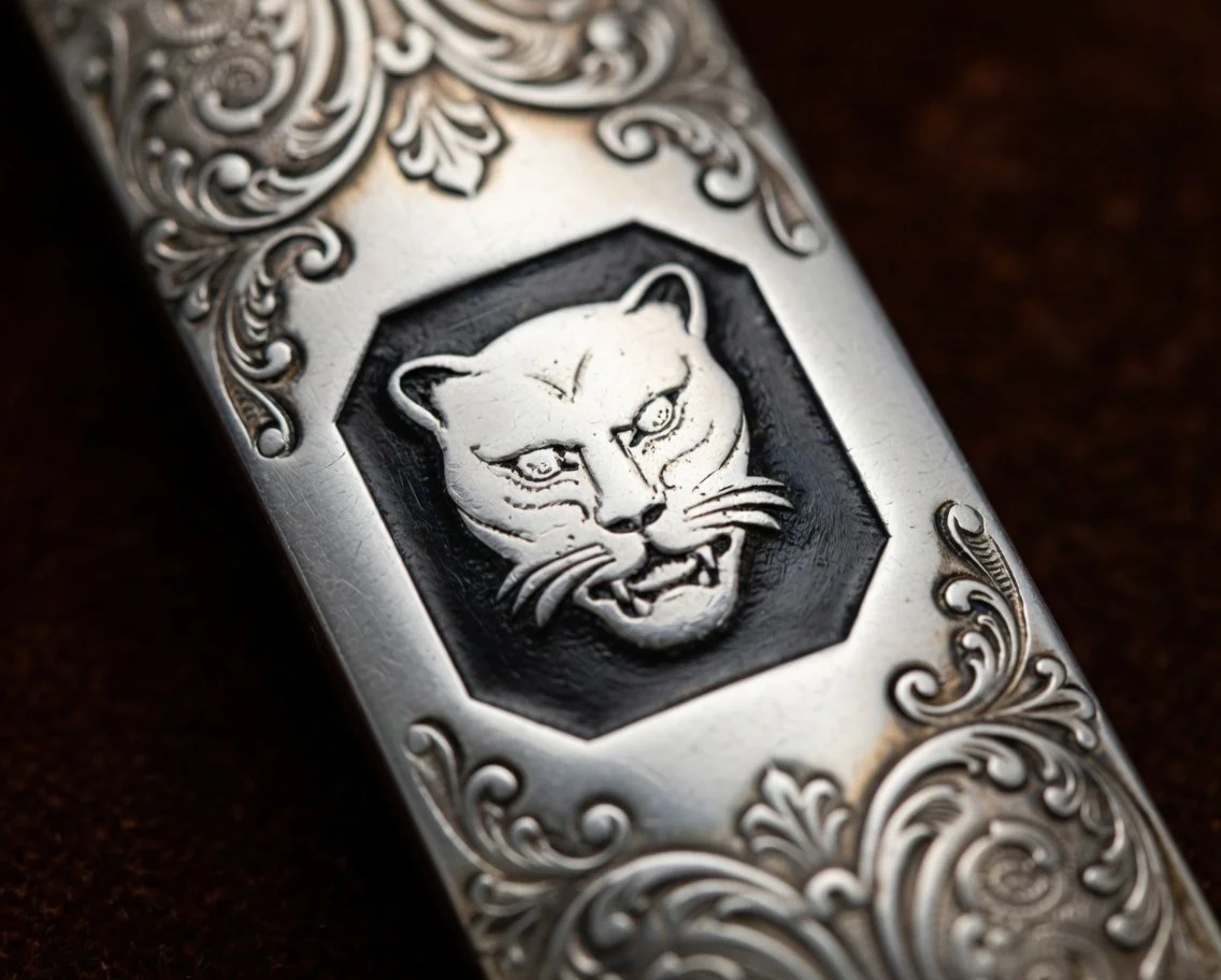 Antique sterling silver dinner knife handle with the classic Leopard’s Head London hallmark