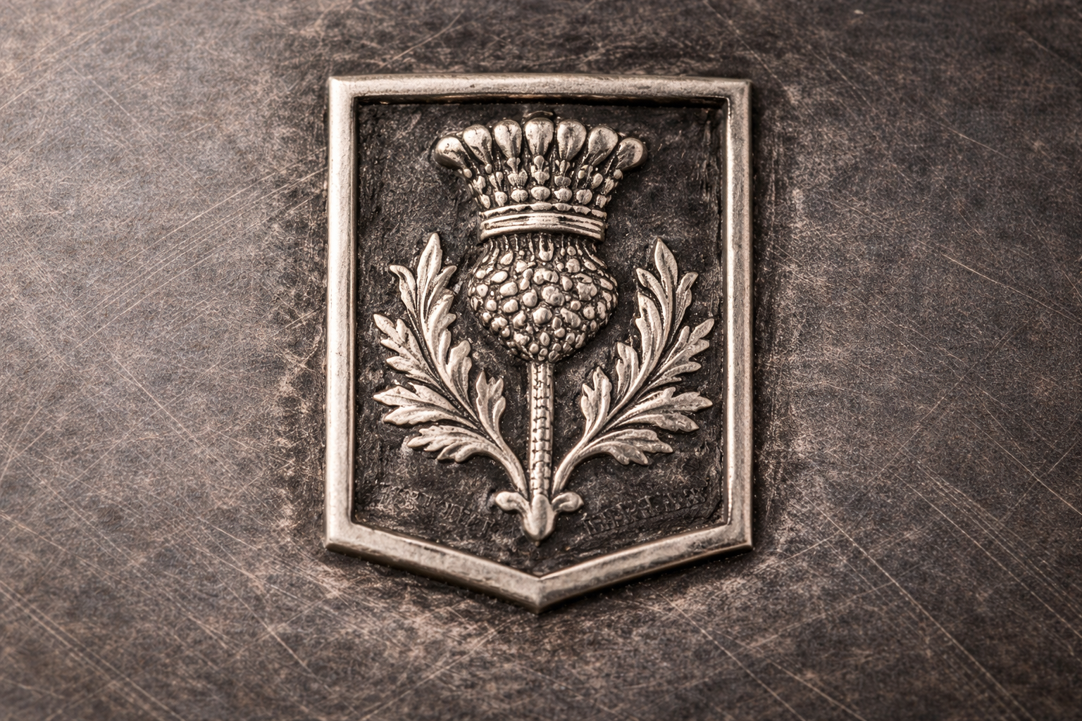 Close-up of authentic Scottish Thistle hallmark on Edinburgh sterling silver