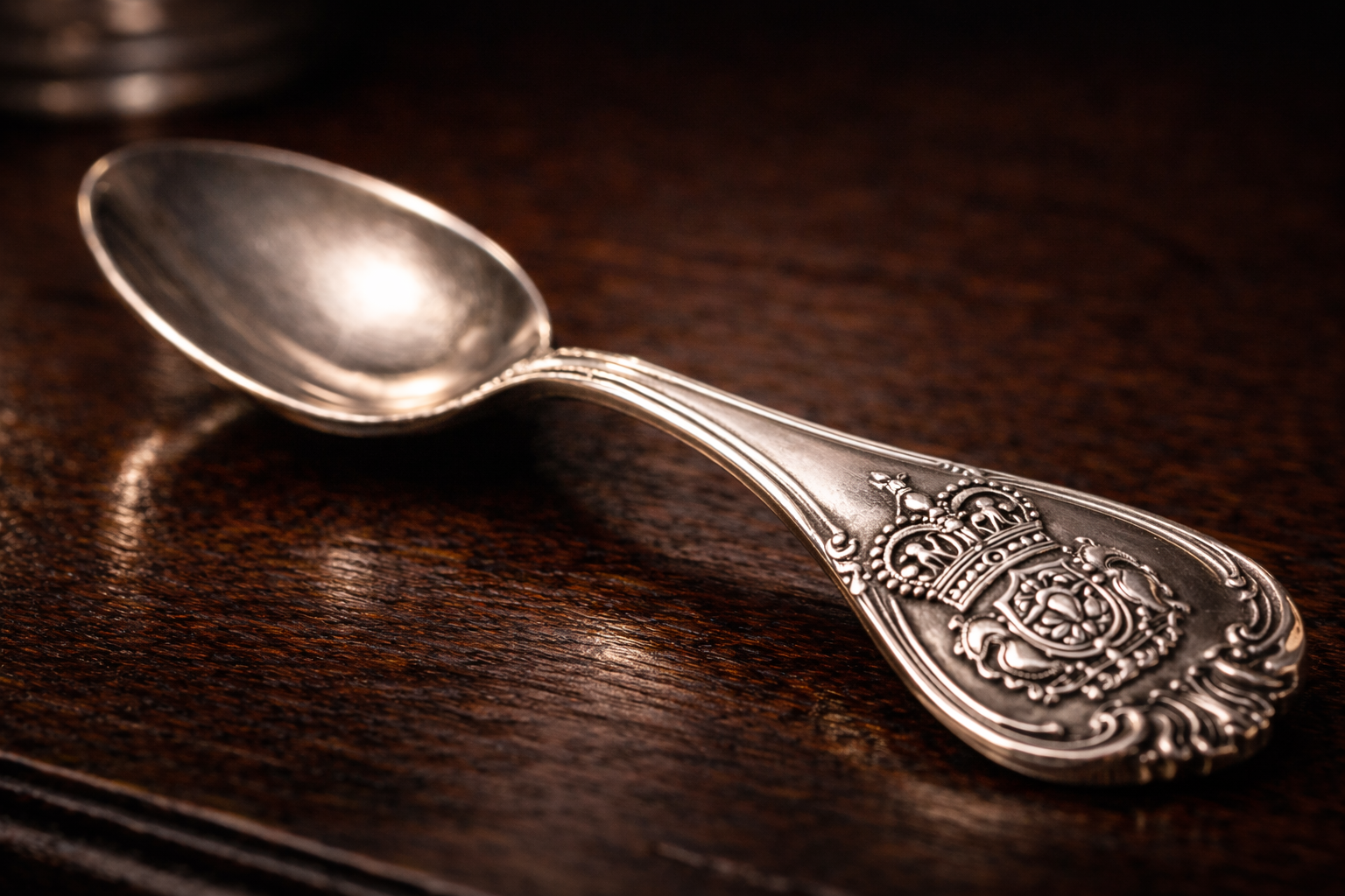 Antique sterling silver teaspoon featuring the Sheffield Crown and Rose hallmark