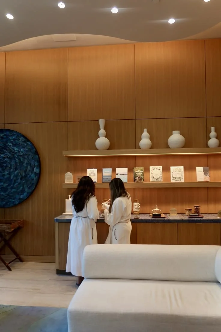 The clinic lounge with two guests in robes