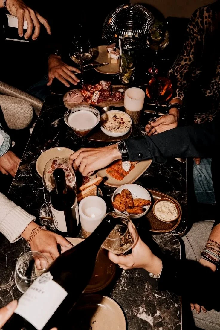 The long table mid-dinner
