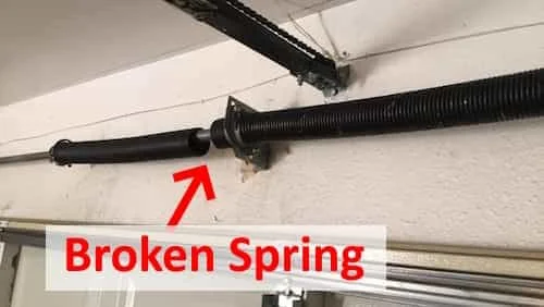 Broken torsion spring — snapped coil