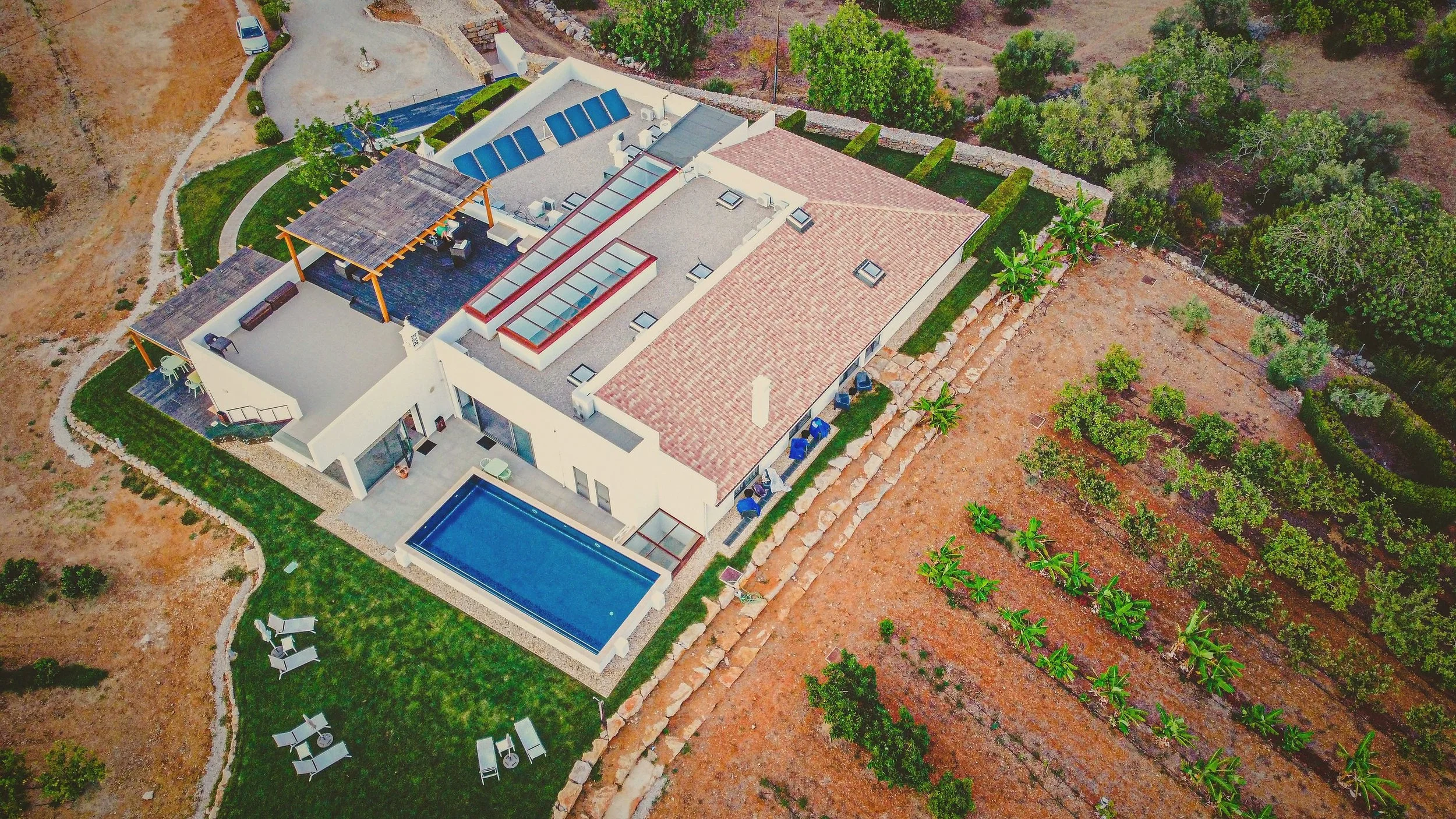 Aerial view of Mercedes Country House nestled in the Algarve hills.
