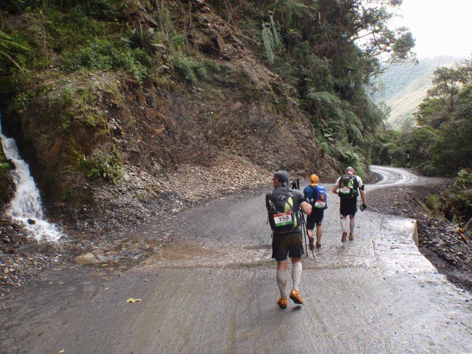 Darren, Arron, and Matt of the Endurance Limits Peru Ultra Marathon team running up a mountain during the adventure in support of Great Ormond Street Hospital.