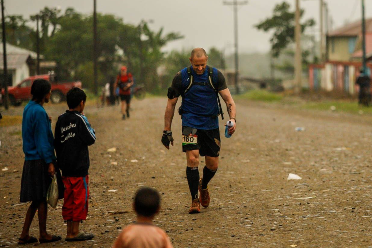 Darren of the Endurance Limits Peru Ultra Marathon team passing through a local village during the charity adventure for Great Ormond Street Hospital.