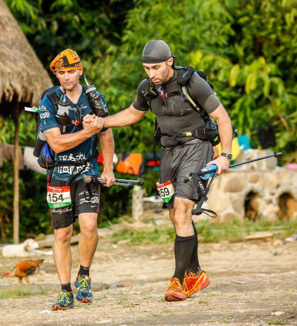 Arron and Matt of the Endurance Limits Peru Ultra Marathon team shaking hands after a challenging stage of the adventure.