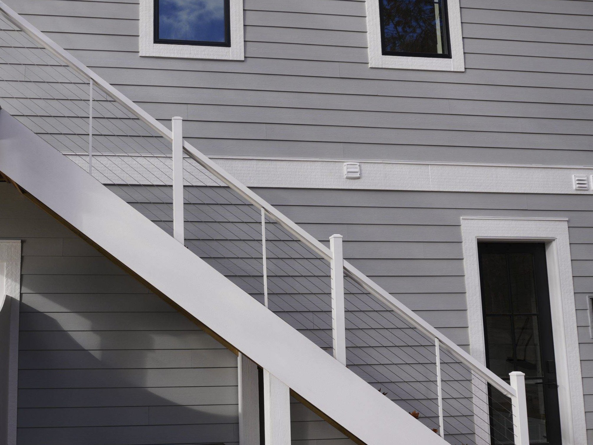 Finished residential exterior with staircase