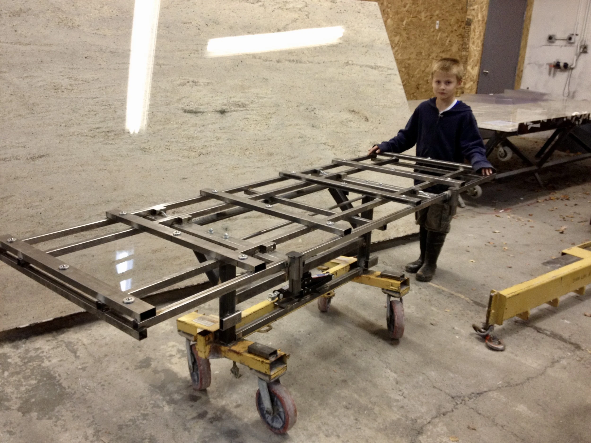 The first fully assembled No Lift System install cart, with its steel support deck rotated flat and extended