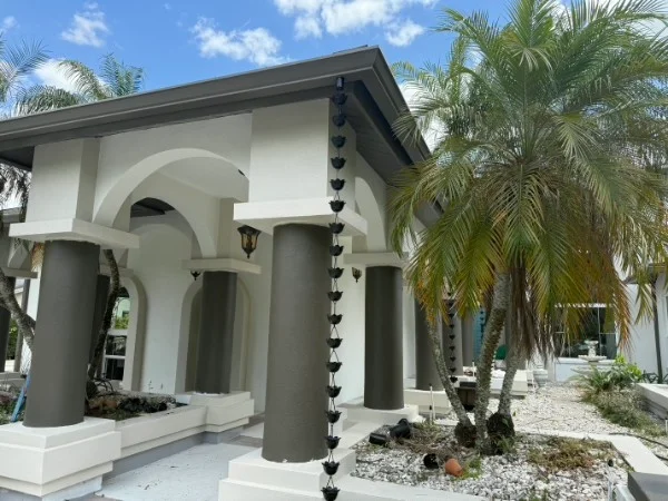 Decorative rain chain guiding water