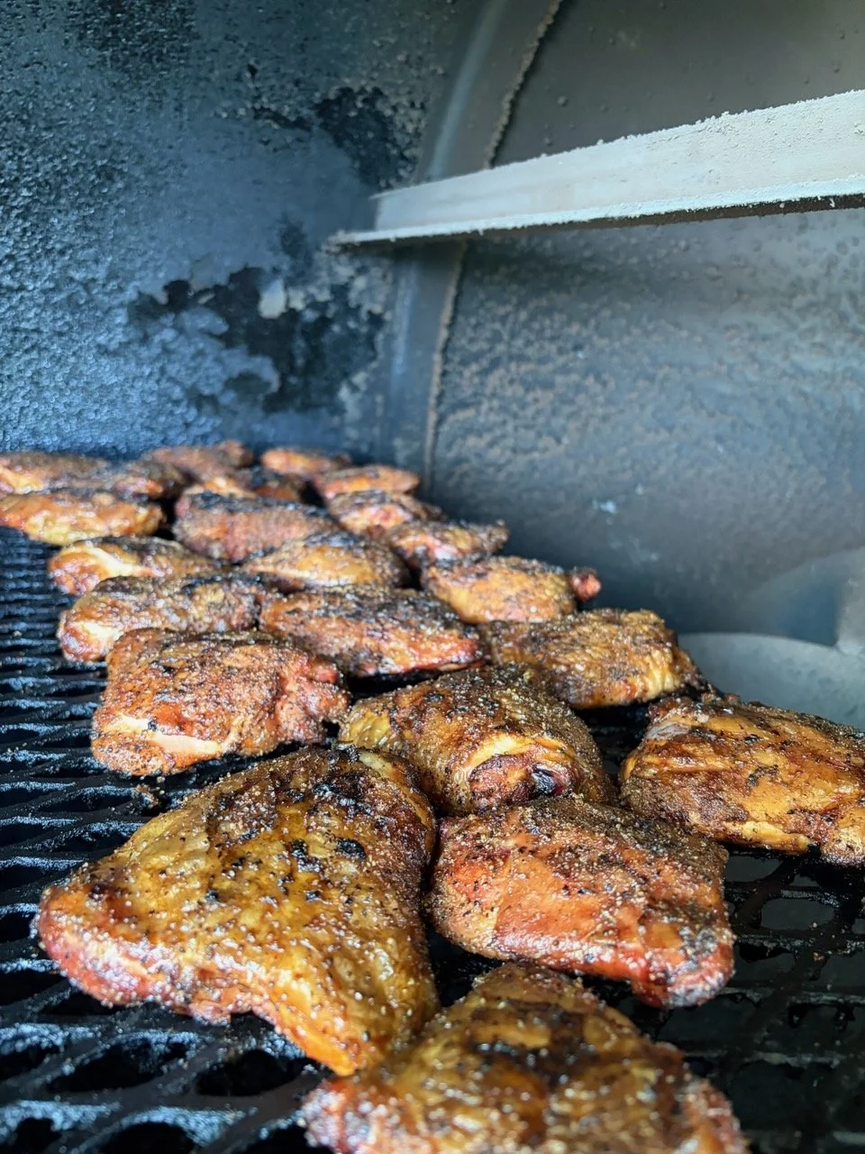 Smoked chicken thighs on the grill