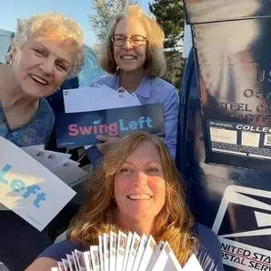 Swing Left group members sending their GOTV letters from Colorado