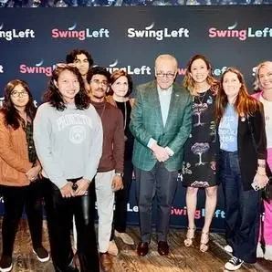 Chuck Schumer with Swing Left staff and supporters at an event in New York City 