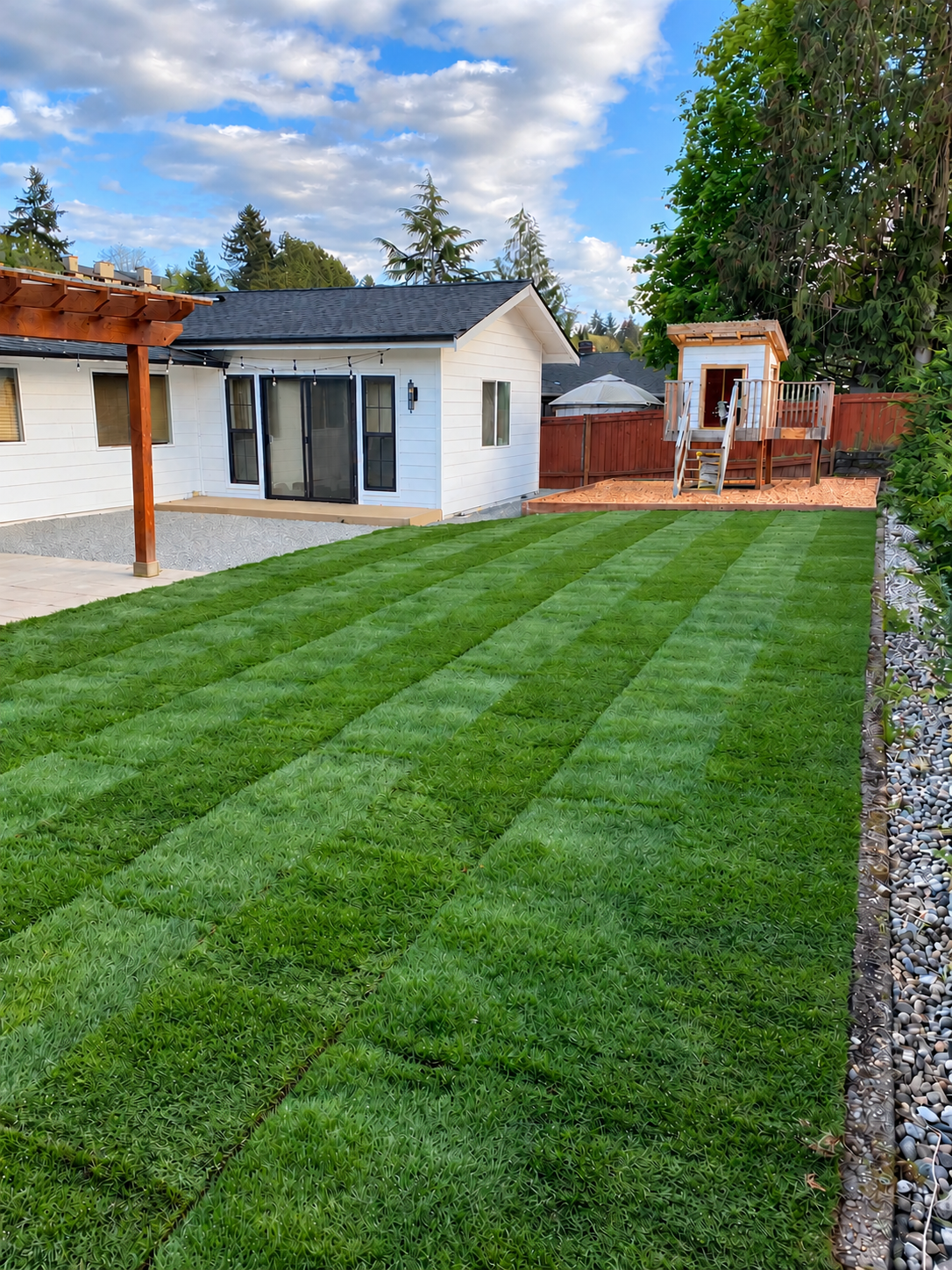 Woodinville home addition overlooking a landscaped backyard