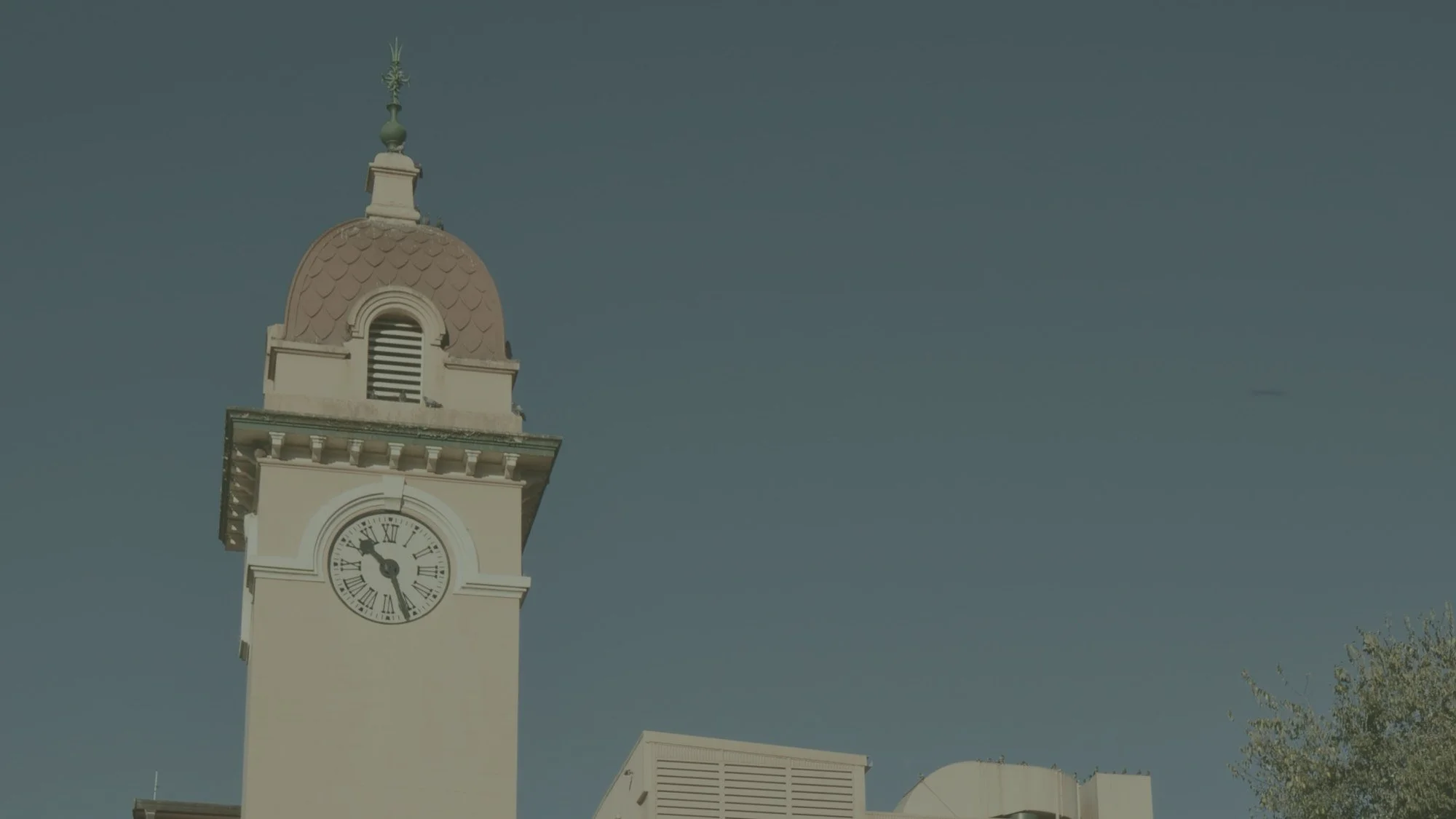 Historic clock tower against a clear blue sky