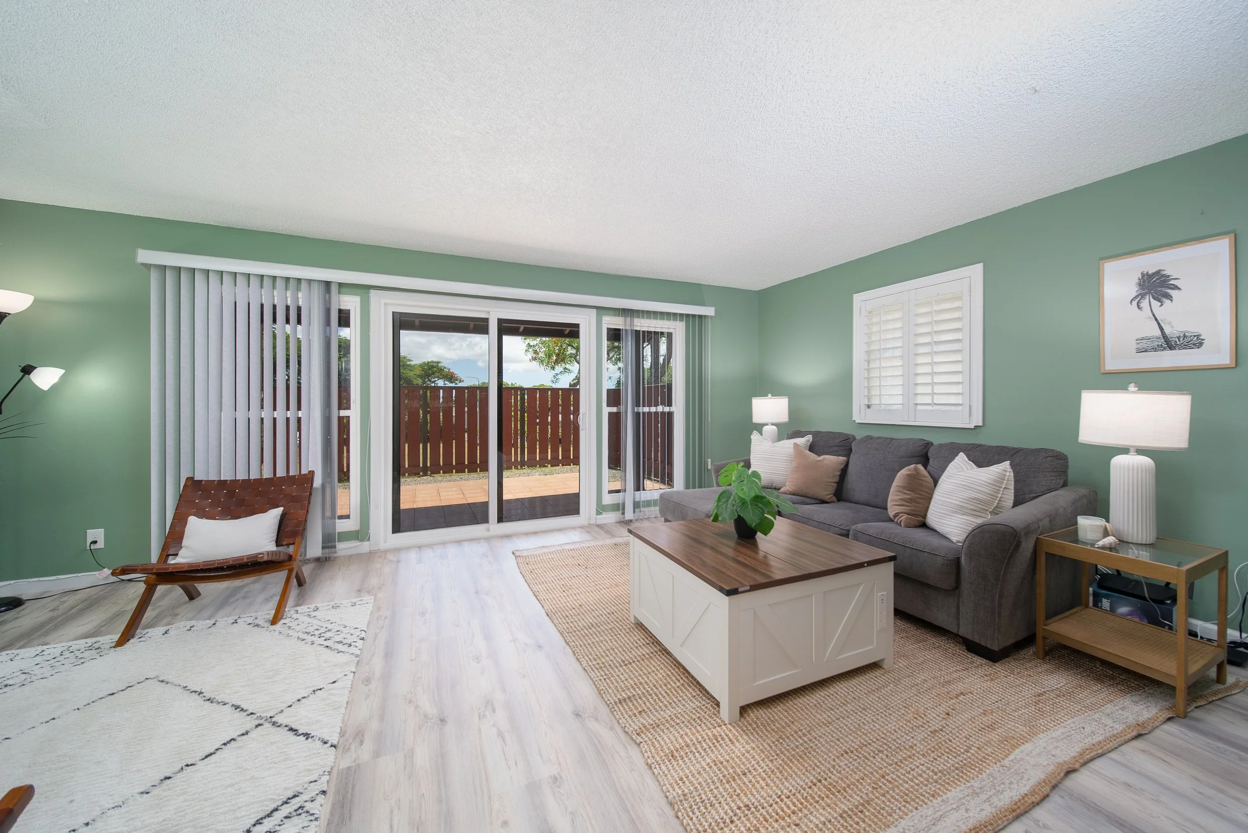 Living room with sliding doors out to the fenced back lanai, Nob Hill Mililani