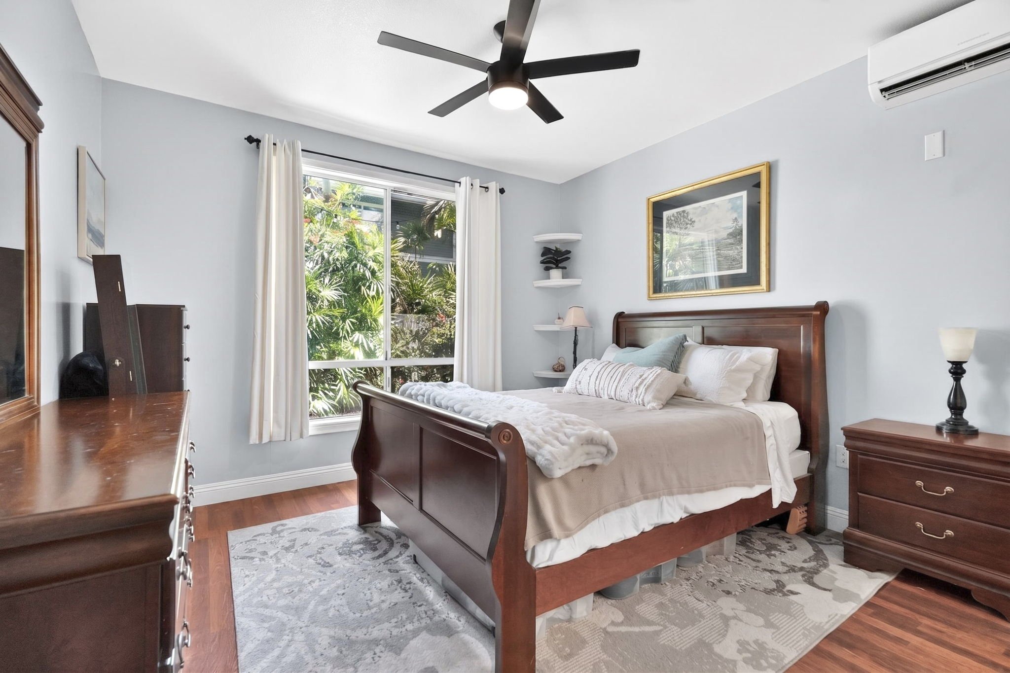 Bedroom with ceiling fan, window and wood flooring, Villages of Kapolei