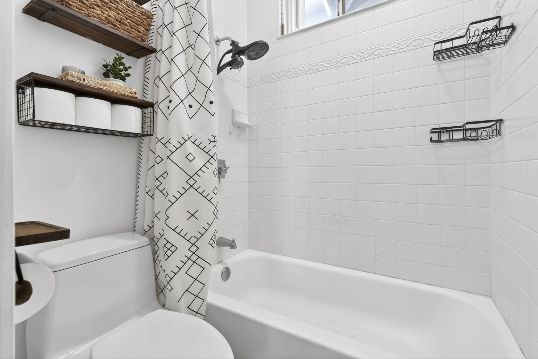 Bathroom with subway tile shower and tub combination