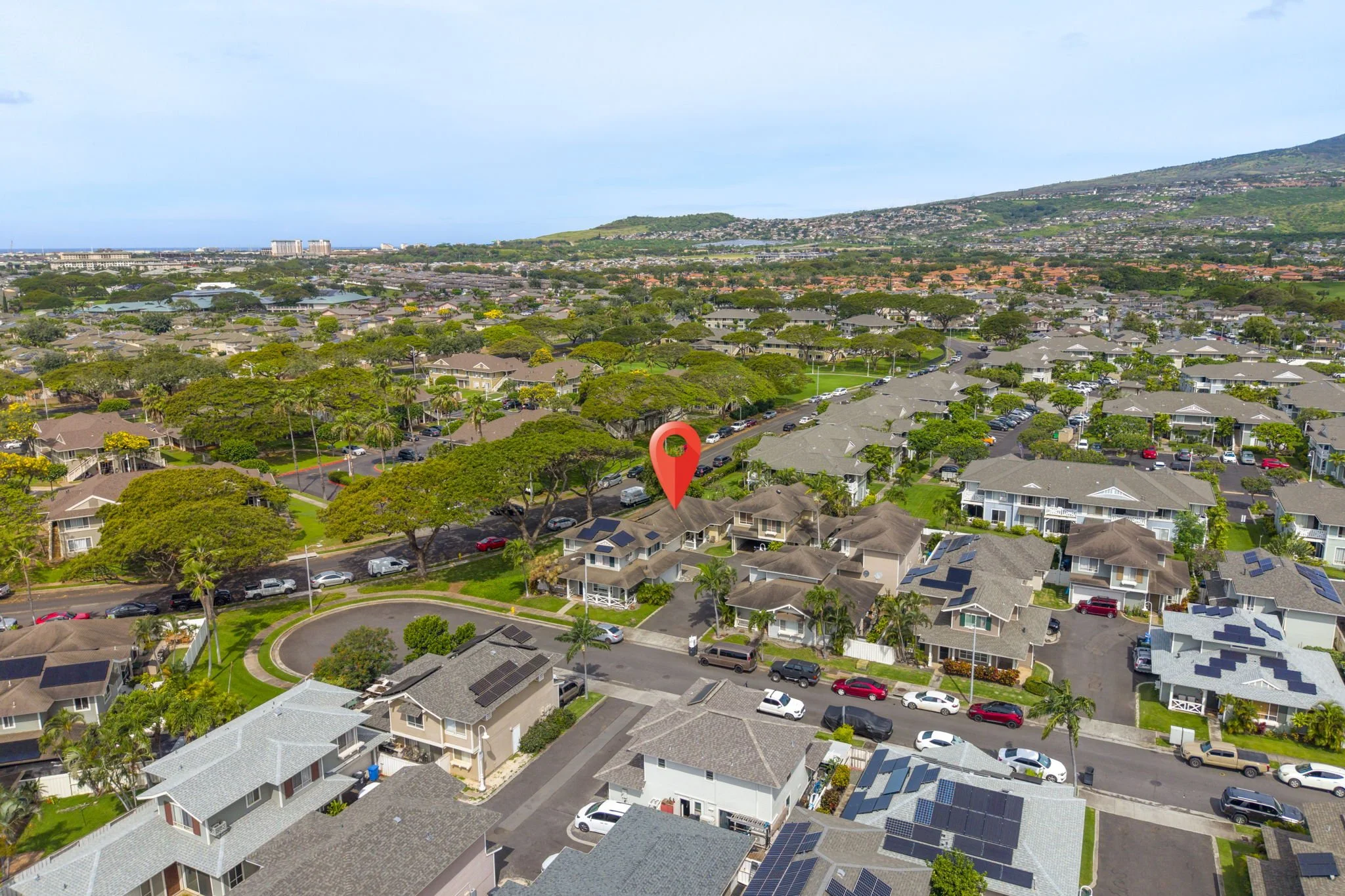 Aerial view of the Villages of Kapolei with the mountains beyond