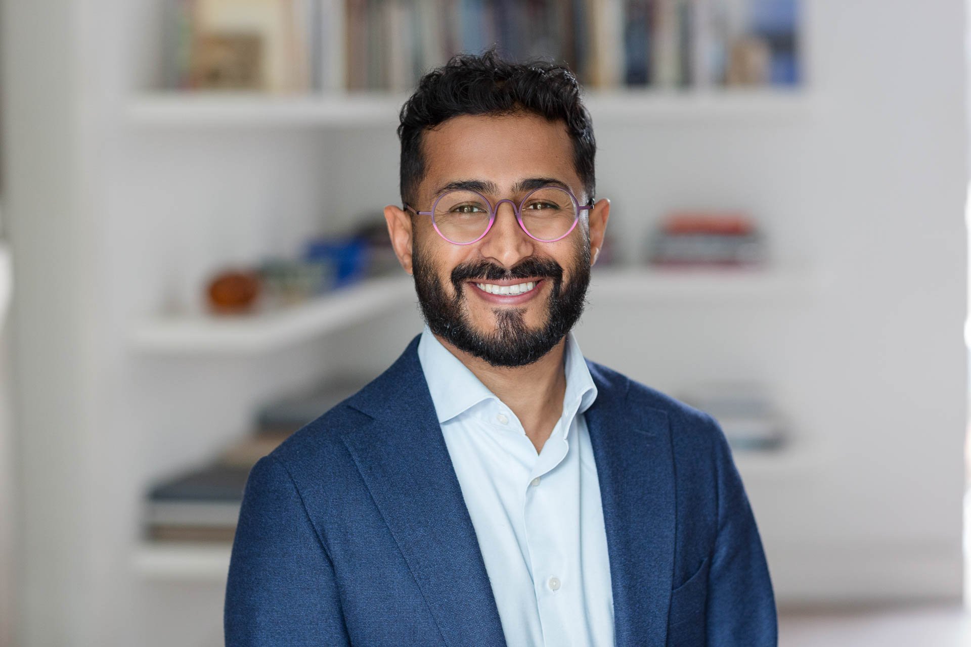 Professional headshot of Dr. Reza Jarral, Harkness Fellow and Health Technologist