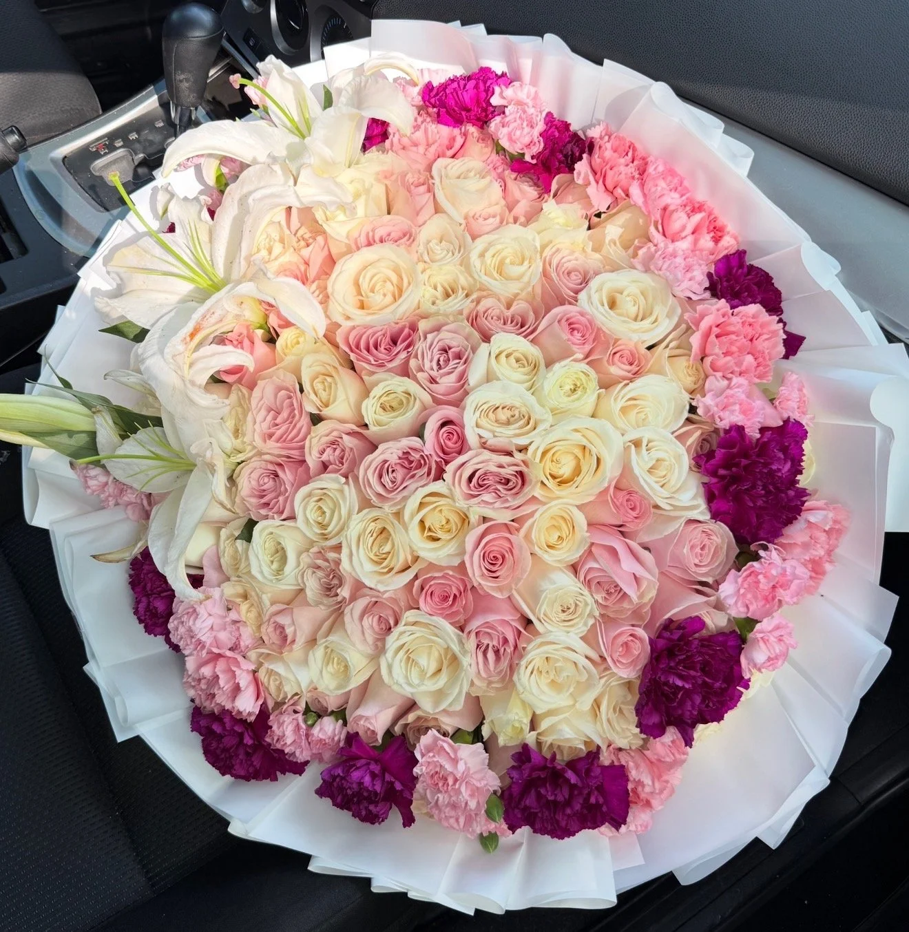 125ct arrangement with lilies and carnation rim