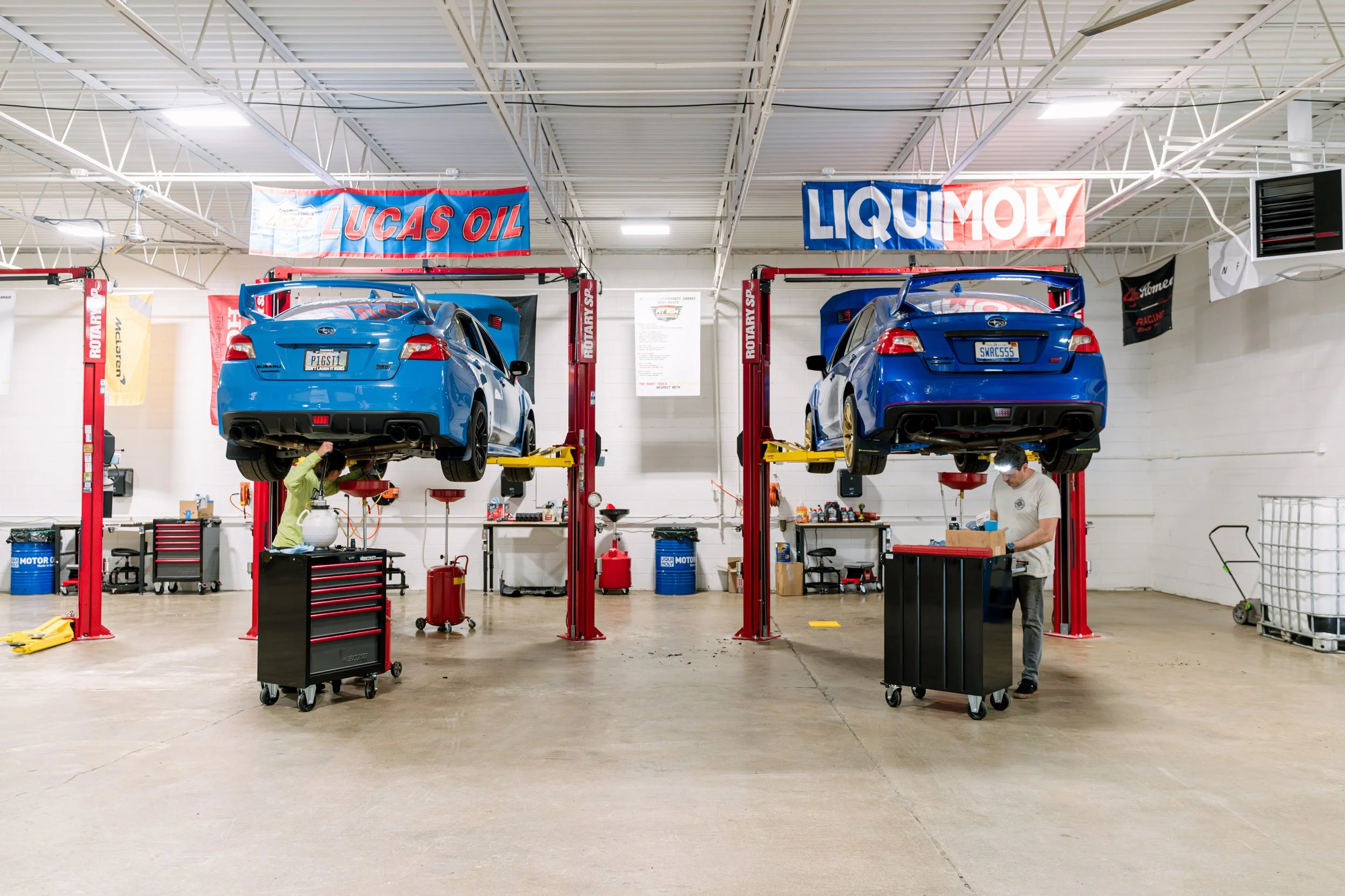 Cars on lifts at Pit Row Performance Garage Columbus Ohio