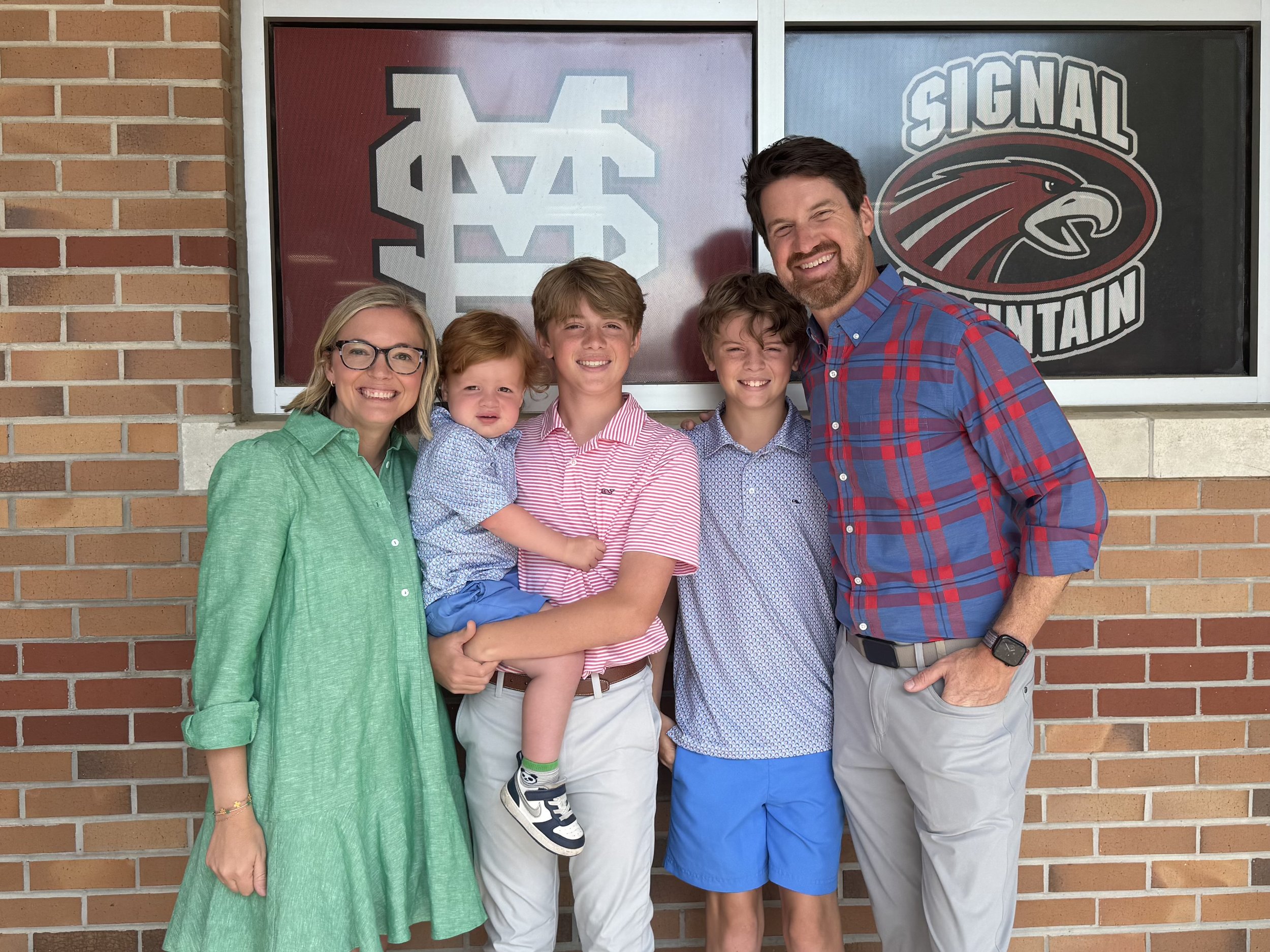 Jessica Whatley with her husband Chris and their three boys