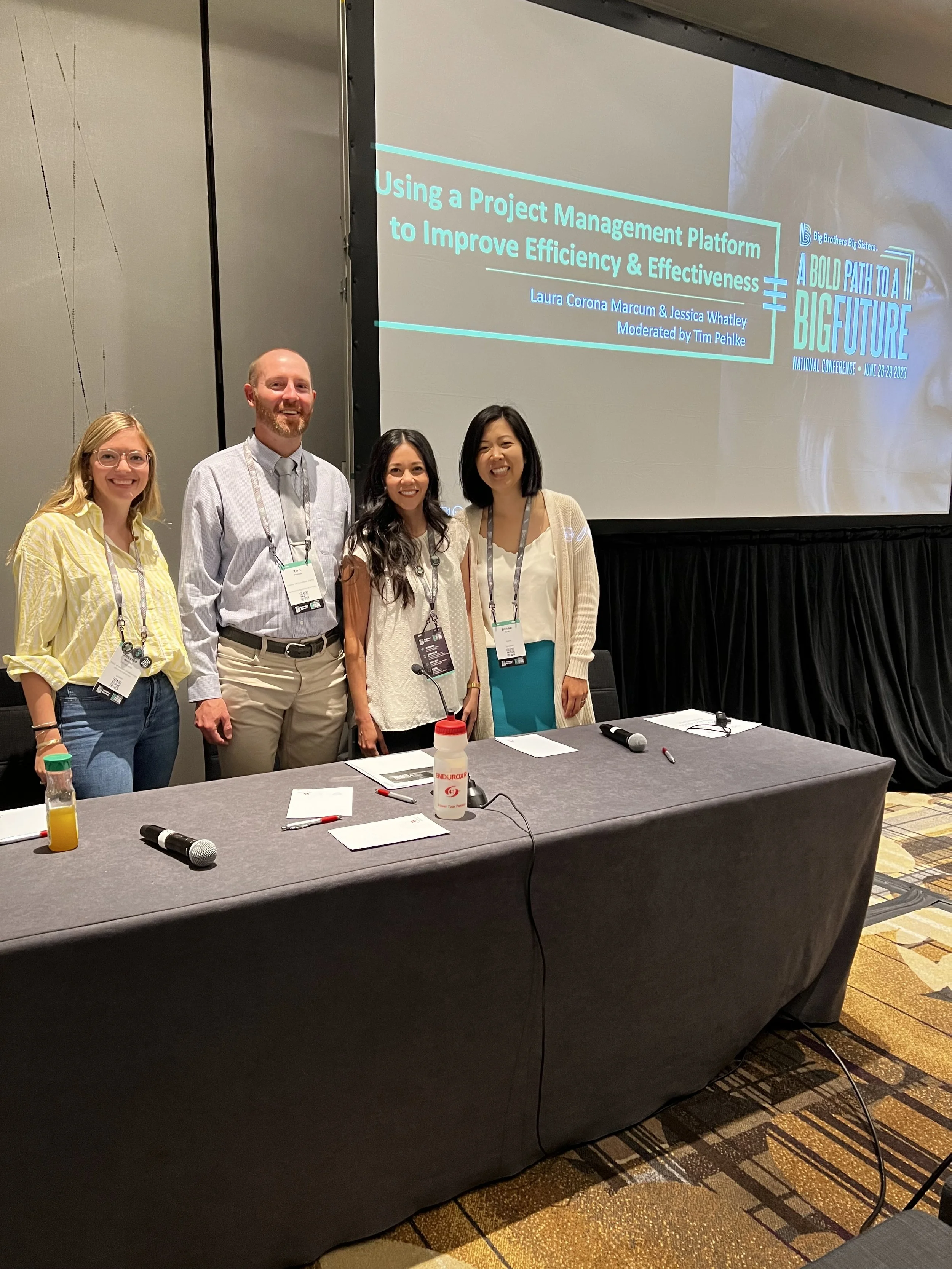 Jessica Whatley with fellow panelists after a session on using project management platforms to improve efficiency