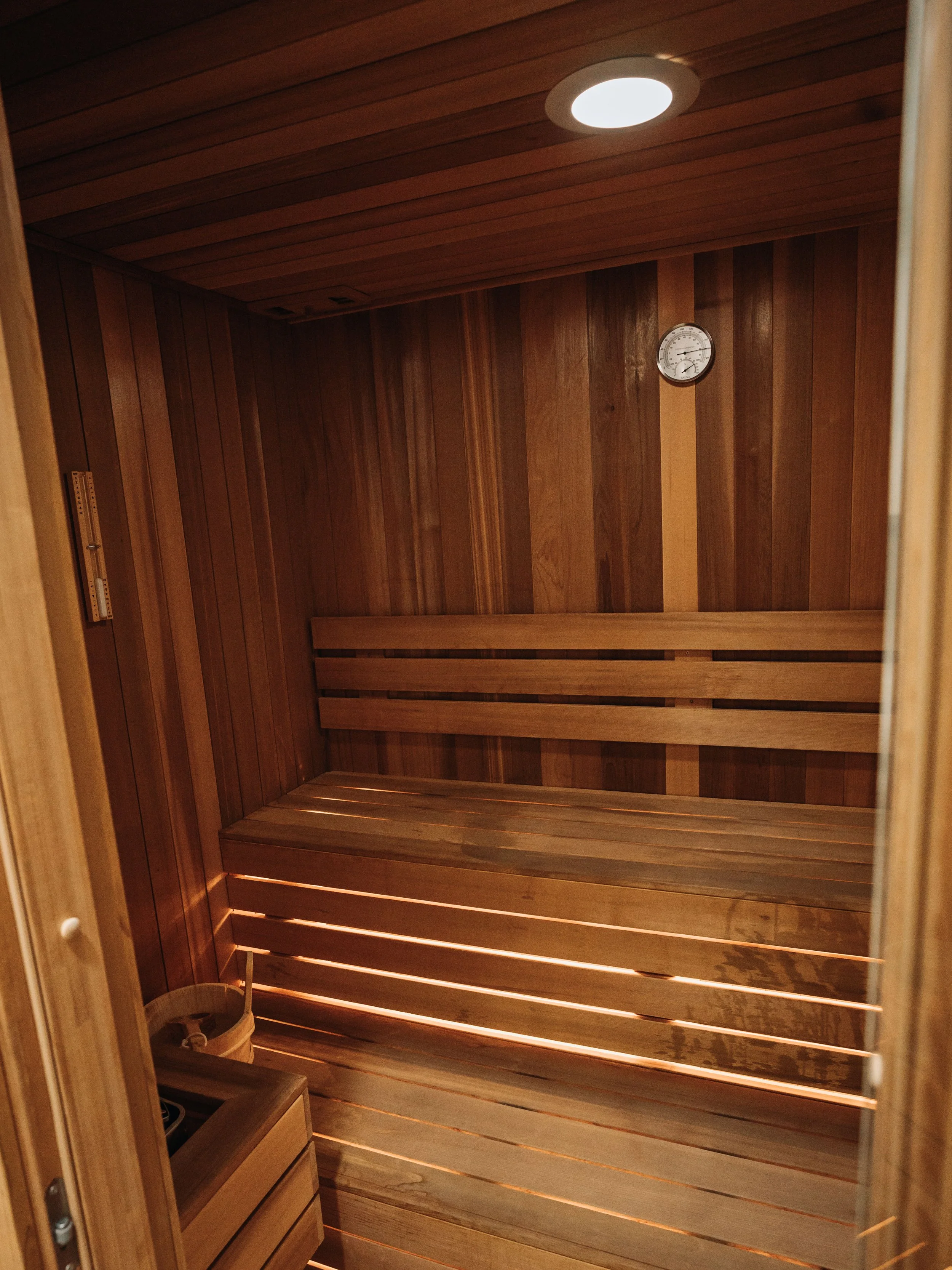 A private cedar sauna suite at Climate Change Studio inside Westwood Fitness