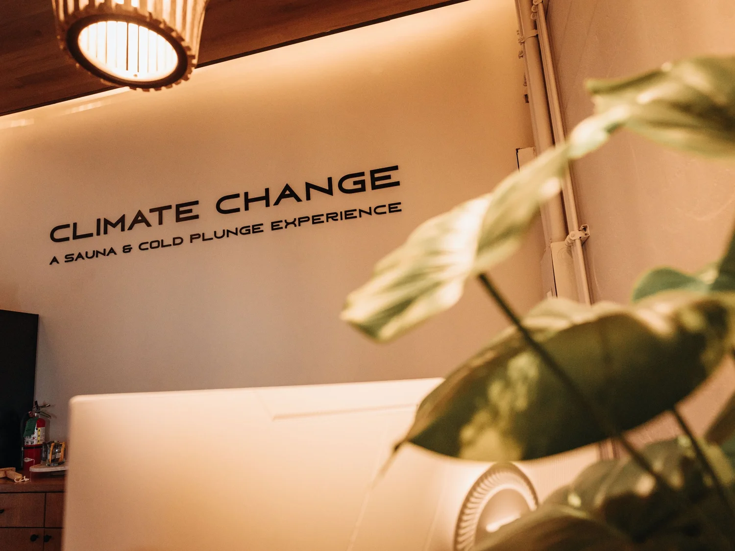 Climate Change sauna and cold plunge studio signage
