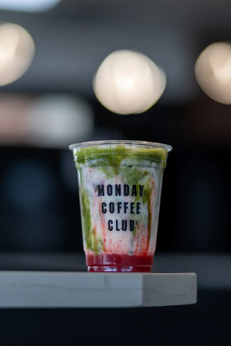 Strawberry matcha layered drink at Monday Coffee Club